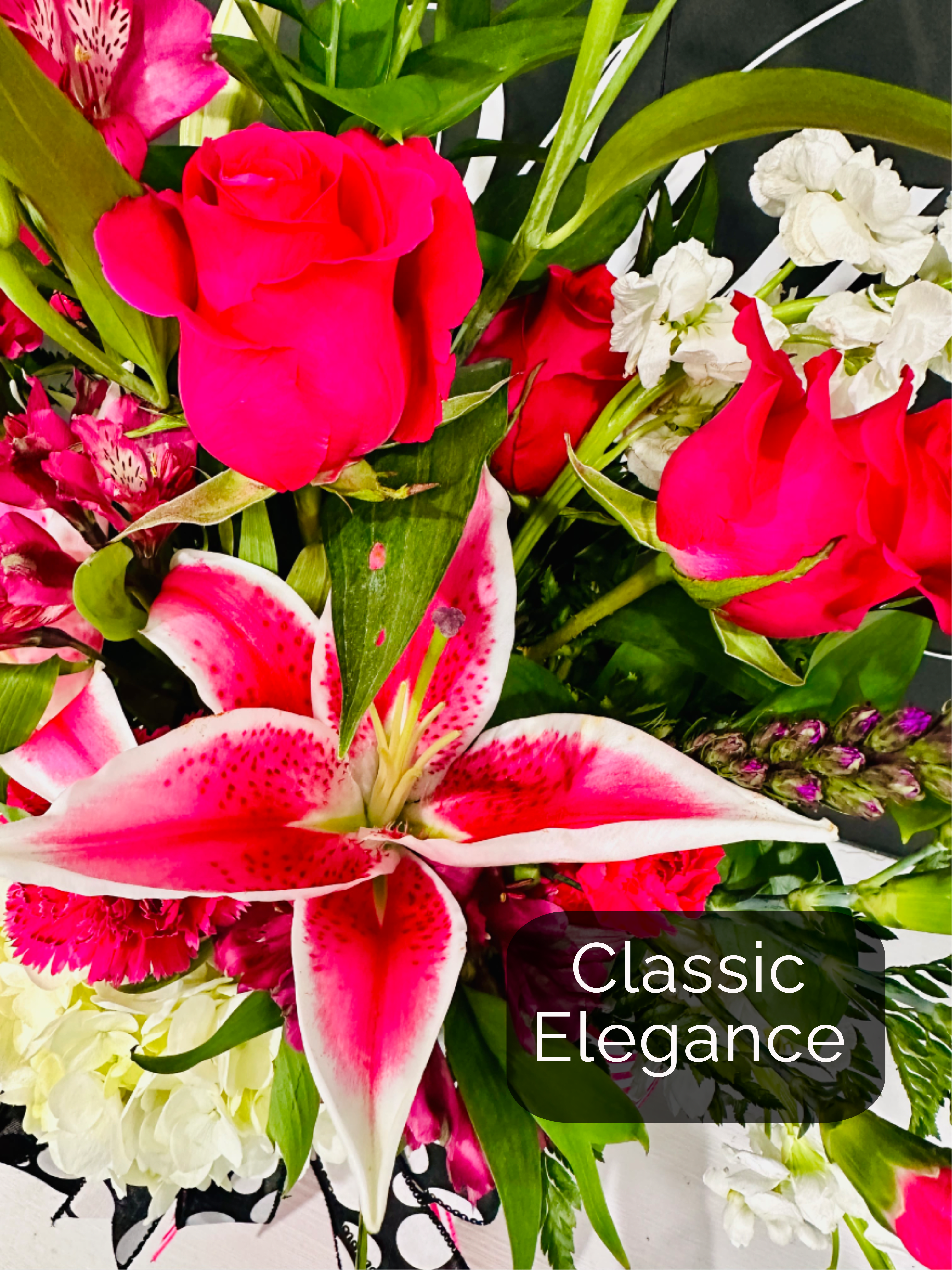 The Classic Bouquet - Classic elegance is always in style!  When you just aren't sure what to send that special someone.  This beautiful classic bouquet is beautiful every time!
