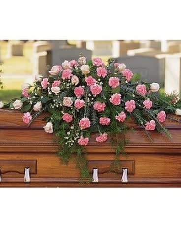 Heavenly Pink Casket Spray - This impressive spray accented with the palest pink roses will help pay your respects, divinely. One casket spray arrives with pink roses and carnations along with distinctive spiral eucalyptus and white Monte Cassino asters. Approximately 59" W x 27" H As Shown : TF199-2