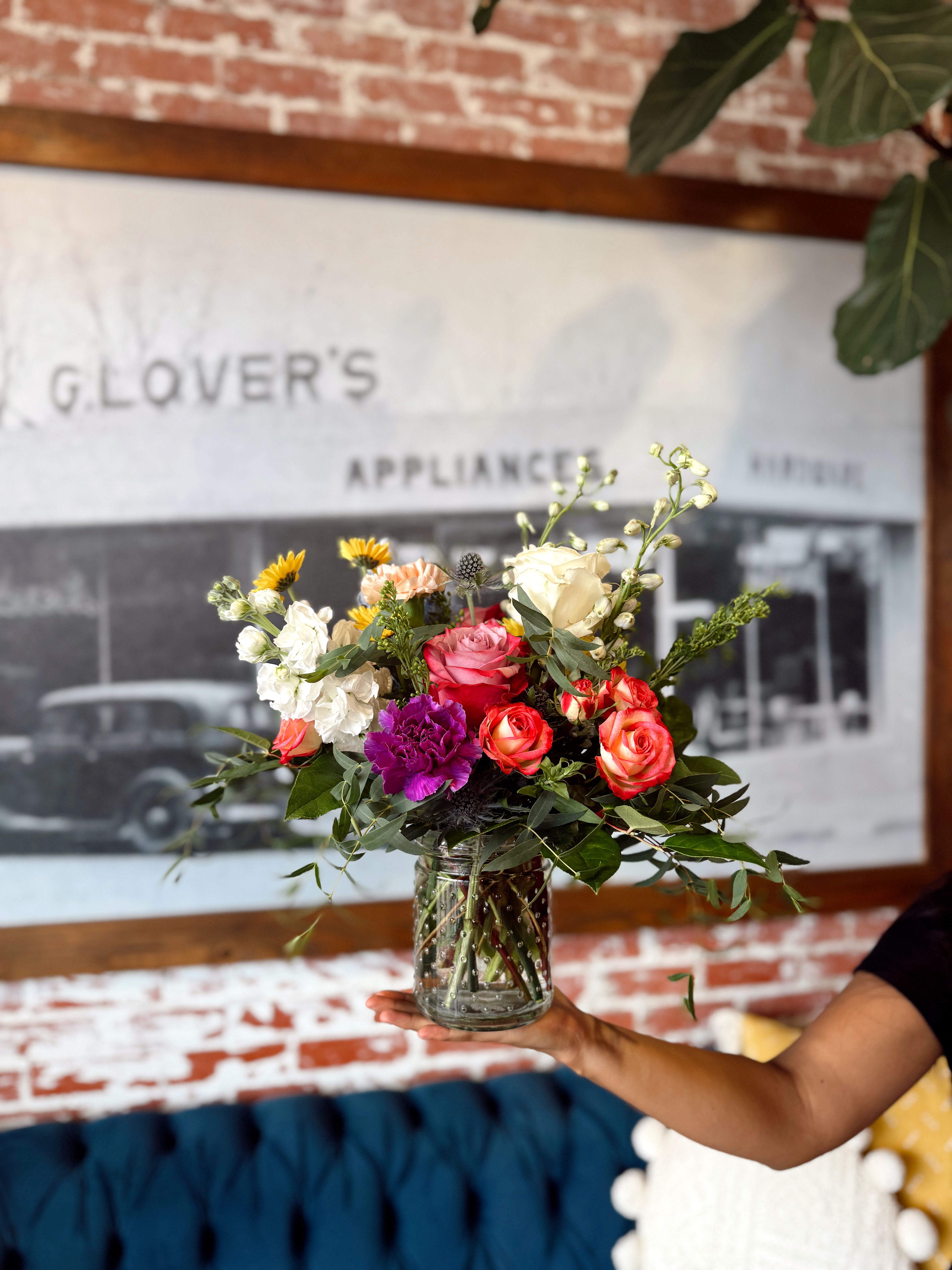 Secret Admirer - A beautiful arrangement of various blooms and a mixture of hues. Flowers and vase will vary.