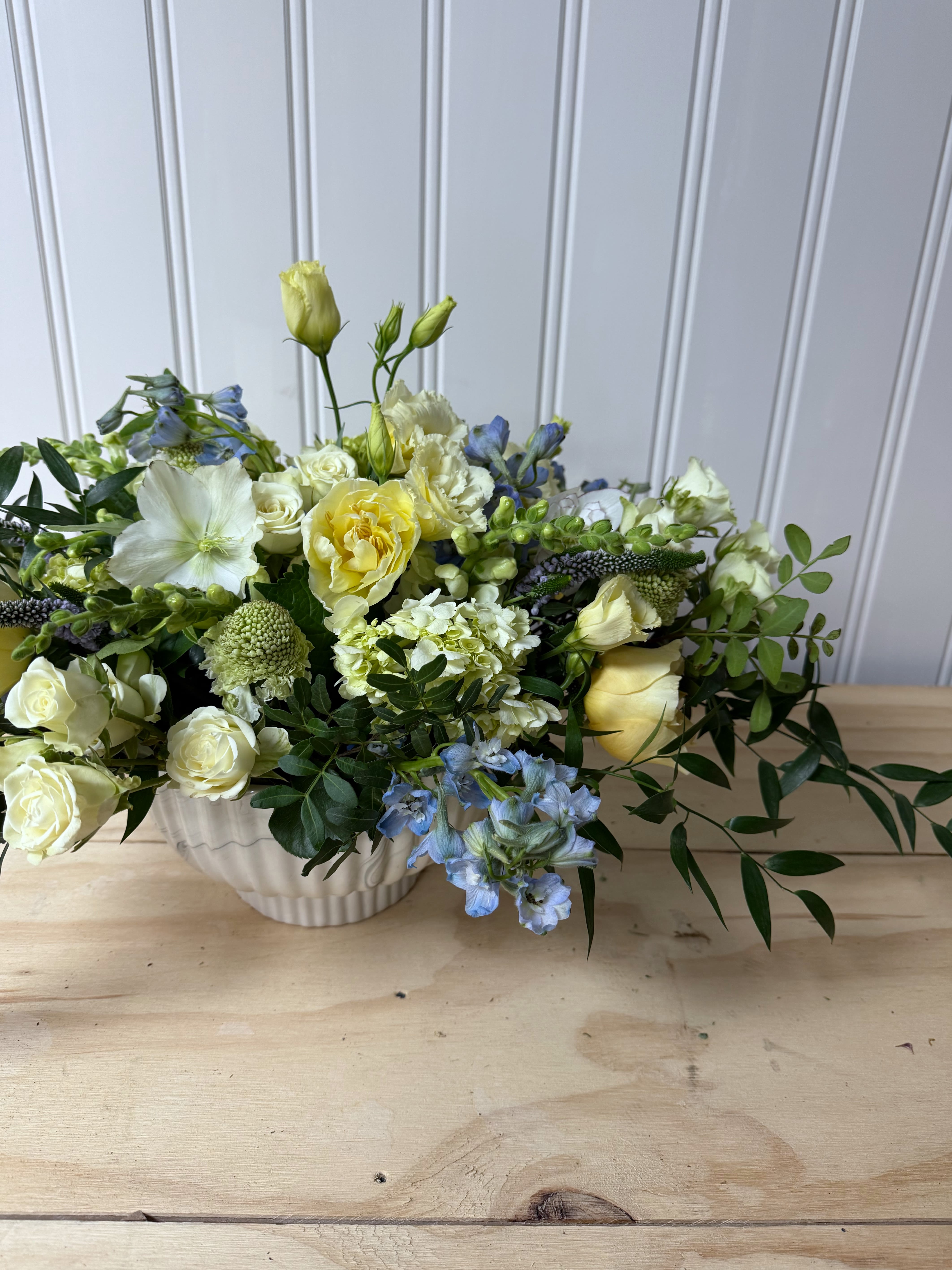 Low &amp; Lush Pedestal Bowl - This low and lush pedestal bowl is perfect for any occasion .. table centerpiece, everyday gift, hostess gift, you name it! The freshest flowers nestled in our marble ceramic bowl. This arrangement can be custom made to your color pallet. If you’d like something other than the colors pictured leave a note at checkout! The premium product is pictured.