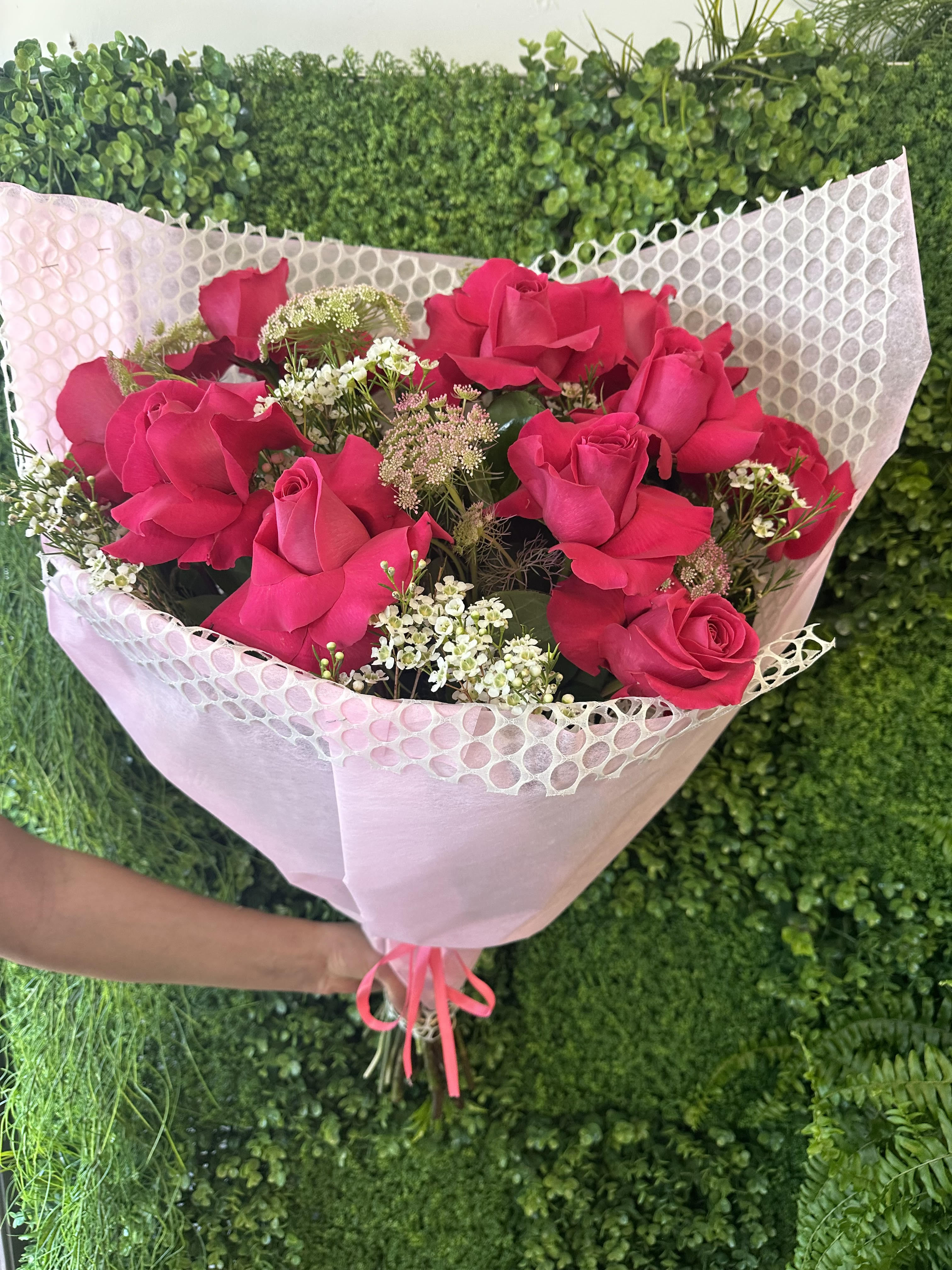 Dozen Hot Pink Roses - 12 Hot Pink Roses with elegant fillers