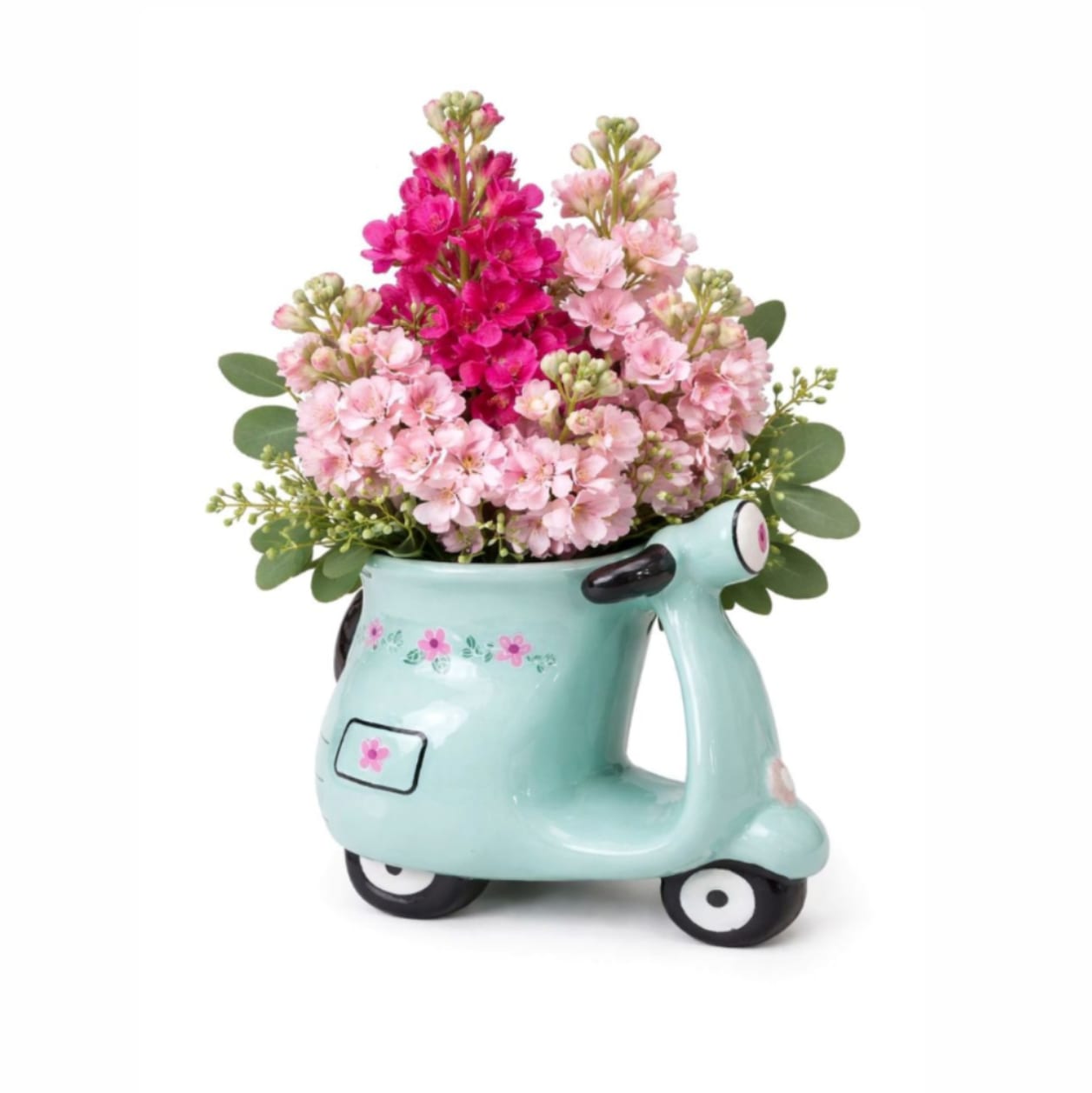 Mint Vespa Blossom™ - A delightful mix of fresh pink blooms and soft greenery arranged in an adorable mint Vespa keepsake. A playful and joyful design that instantly brightens any space.  Better for: Birthday, congratulations, friendship, thank you, get well, just because. 