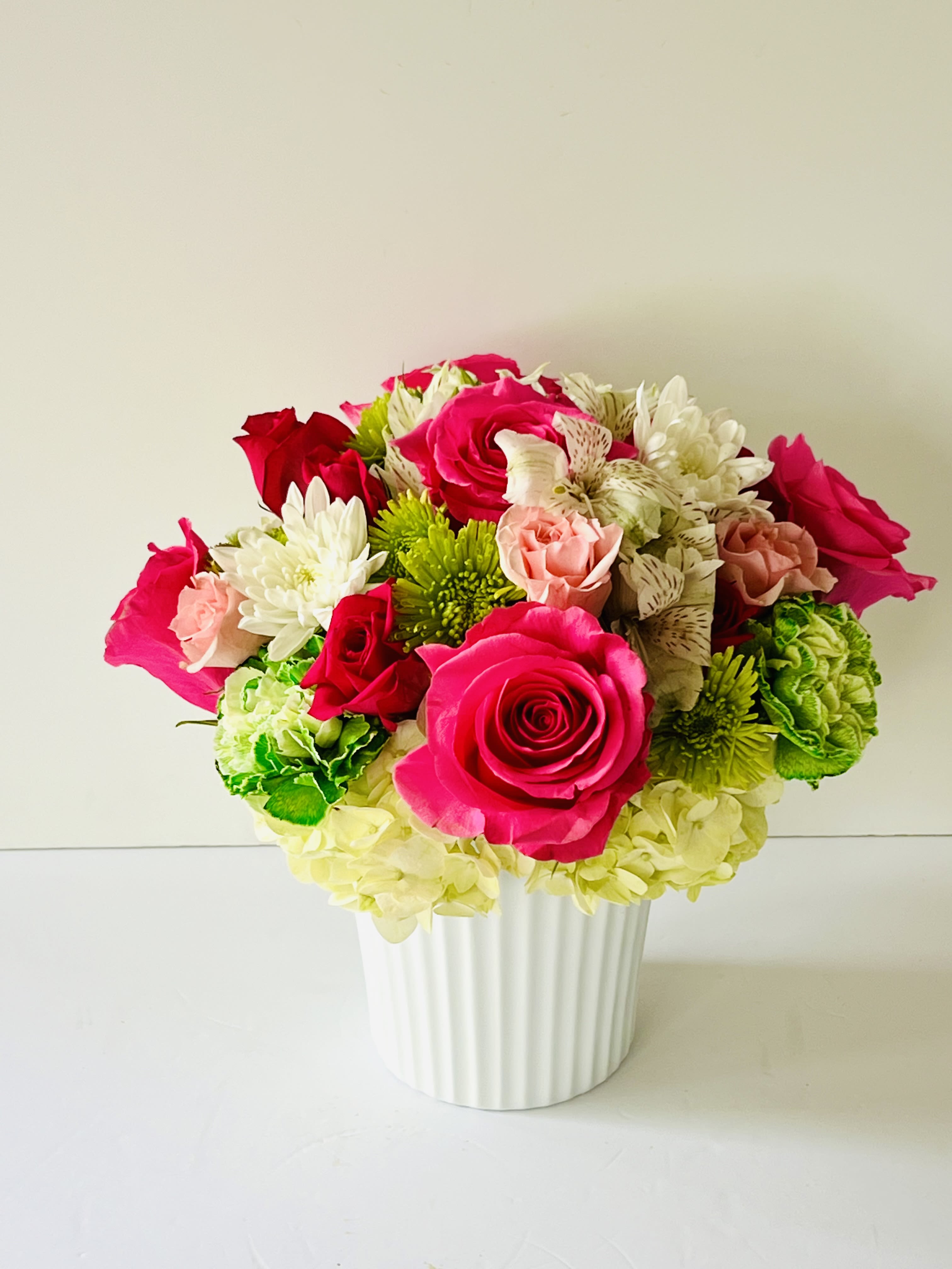 Timeless Grace  - A tender and elegant arrangement featuring soft hydrangeas and classic roses, Timeless Grace is a heartfelt tribute to unconditional love. With its gentle hues and lush blooms, this bouquet brings warmth, beauty, and gratitude.For same day delivery and Free Delivery Options Text or Call  832-973-1376.