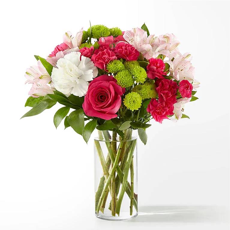 Sweet &amp; Pretty Bouquet V-B35 - The true beauty of this bouquet is within the sweet colors of the flowers. An array of hot pink roses, pale pink alstroemeria and more are set in a glass cylinder vase, making a wonderful gift to light up the face of its recipient.