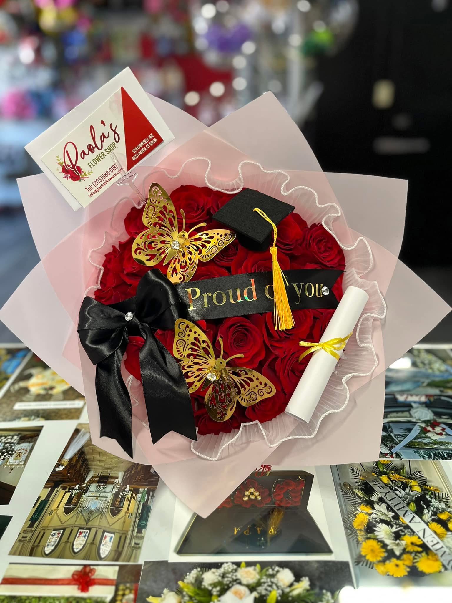 Proud of you buchon  - 24 red long stem roses with with graduation accessories. Please note color paper can change based on request! 