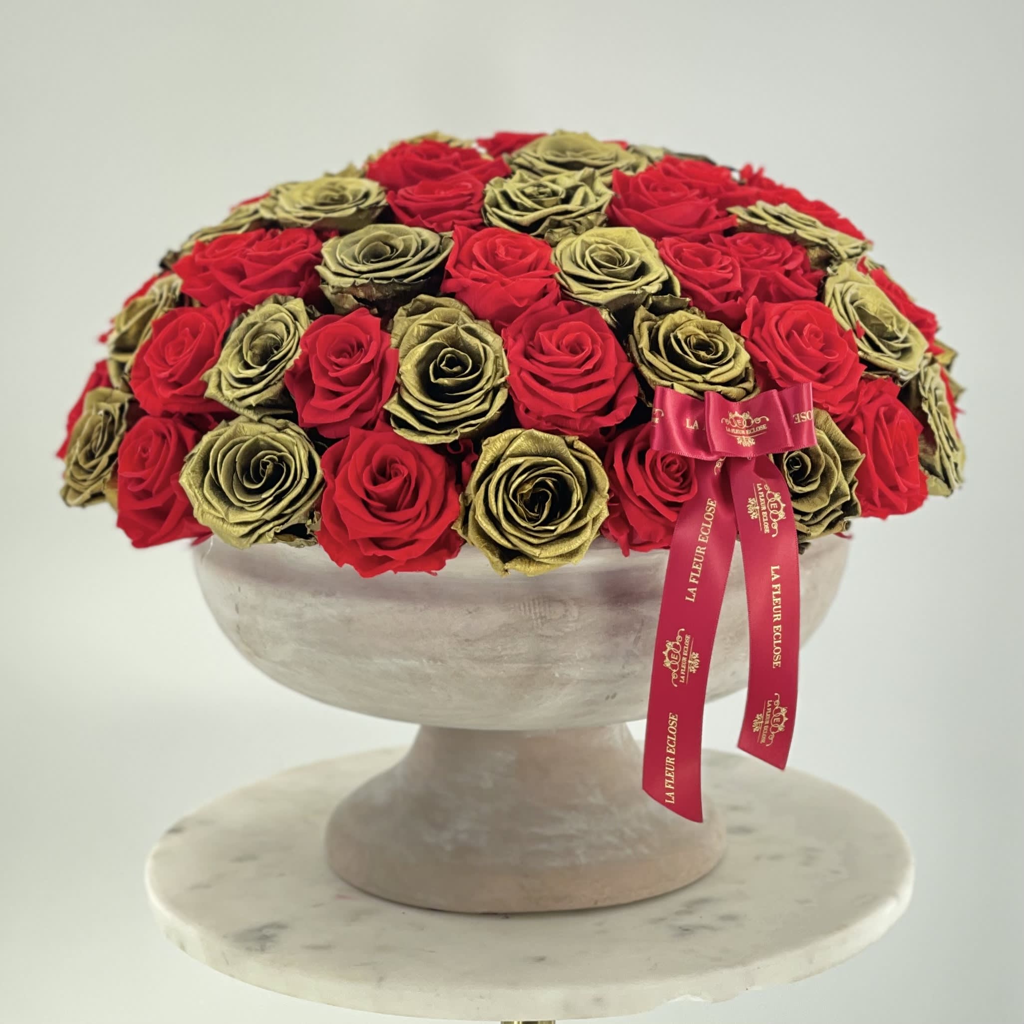 Preserved red  Roses and gold - 72-78 preserved roses ( last a year) in a clay vase