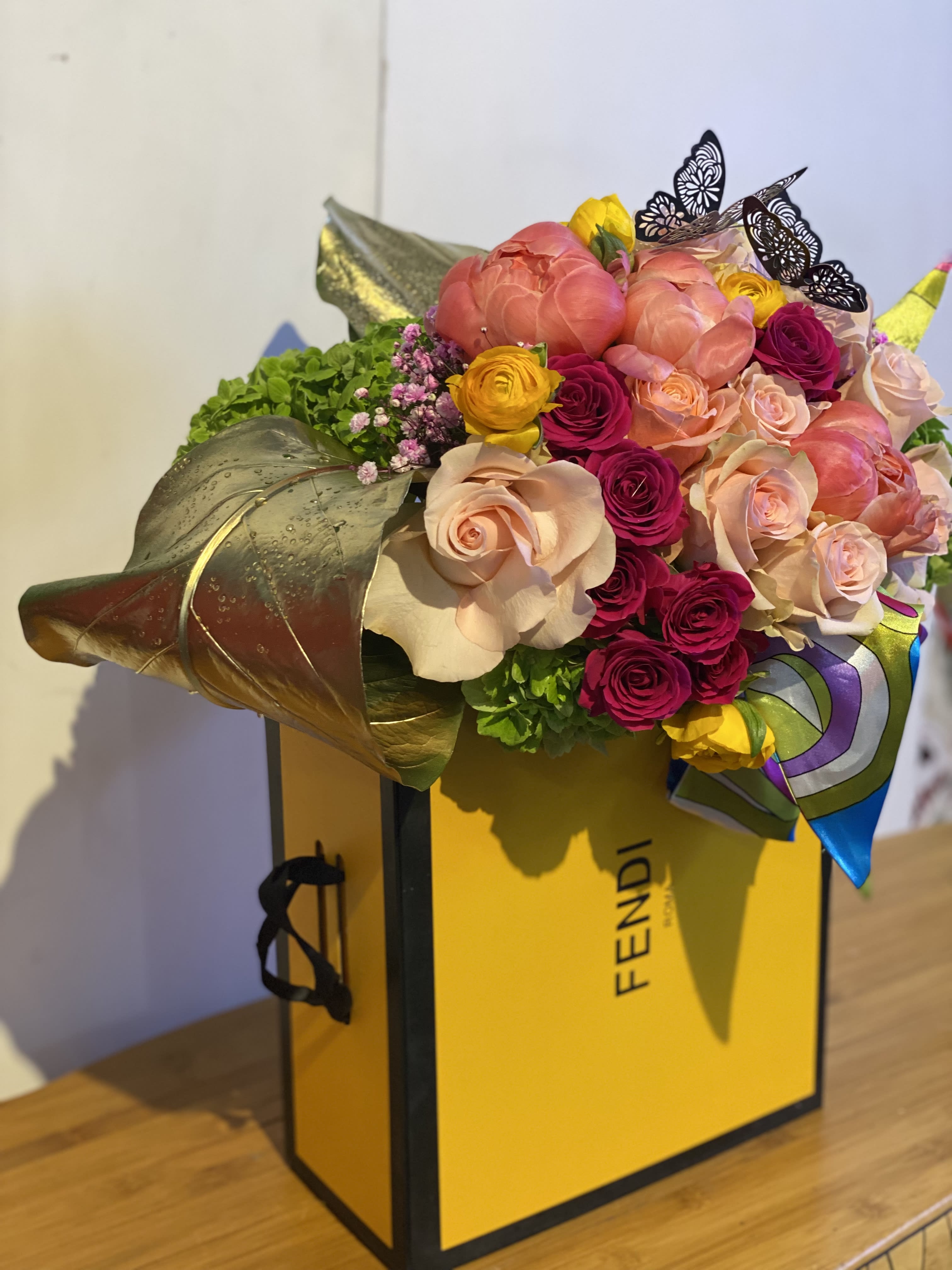 FENDI-FABULOUS (available in various brands) - A chic arrangement for that fashion forward person. 