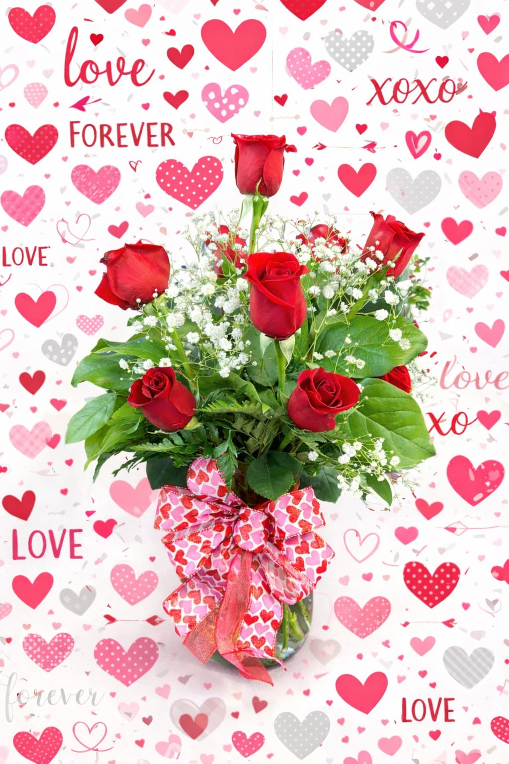 One dozen red roses - Beautiful red roses arranged in a vase with filler flower and greens.