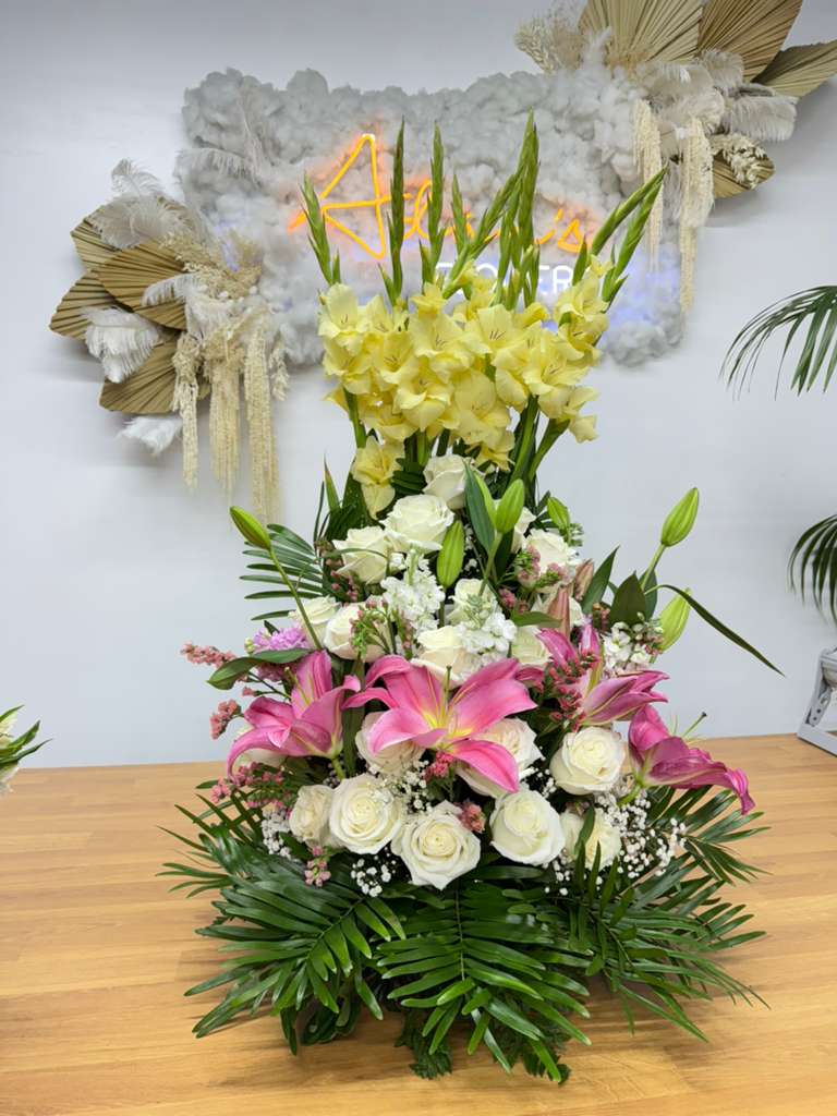 For you - Vibrant bouquet filled with a wide variety of fresh flowers in many colors, beautifully arranged to create a joyful, lively, and eye-catching display. Perfect for brightening any occasion.