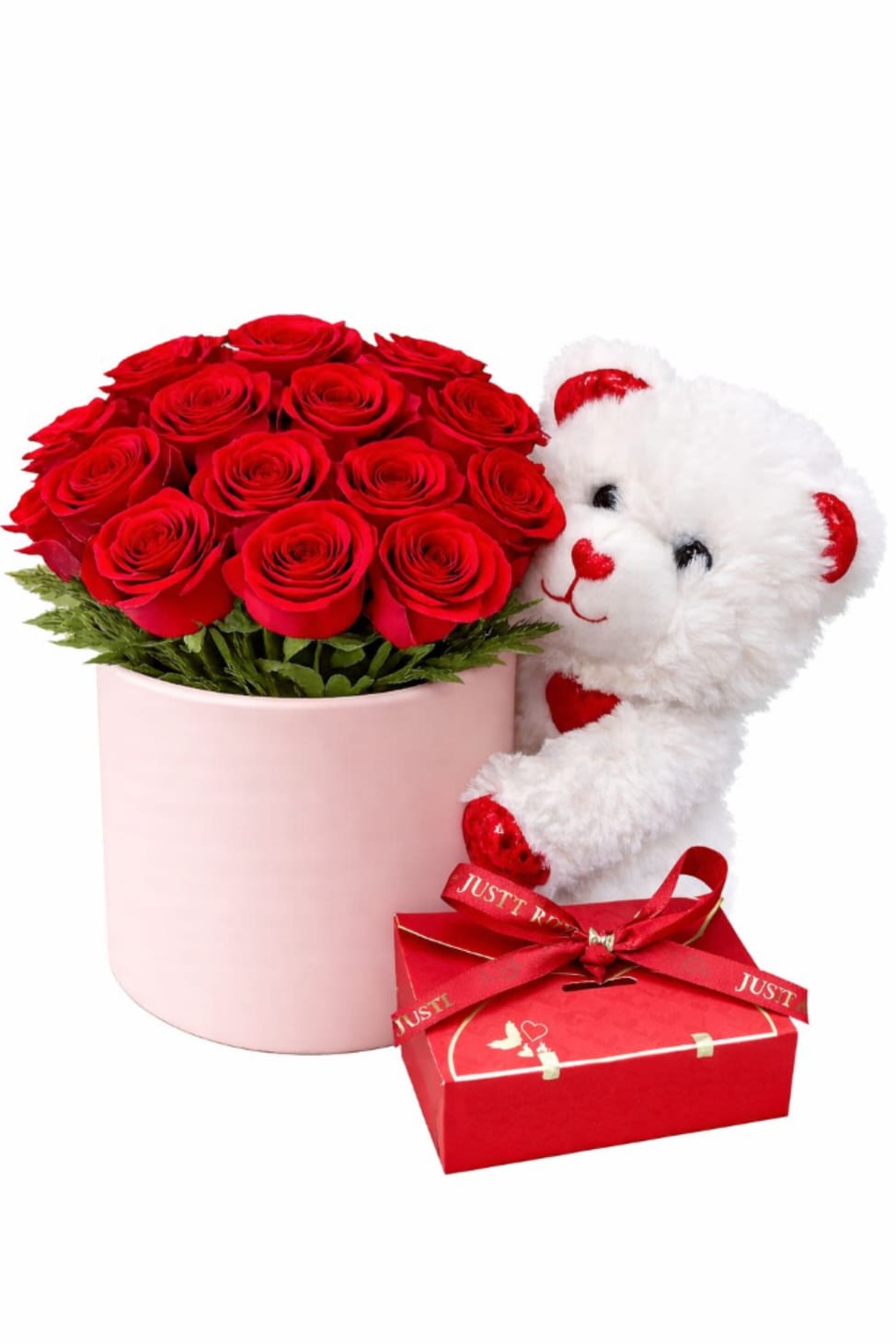 Red Rose &amp; Teddy Gift Box™ - A romantic arrangement featuring a lush arrangement of premium red roses beautifully designed in a soft pink hat box, paired with an adorable plush teddy bear and a sweet chocolate gift. A classic combination that delivers love, warmth, and a big smile.  Better for: Valentine’s Day, anniversaries, romantic surprises, I love you, birthdays, just because.