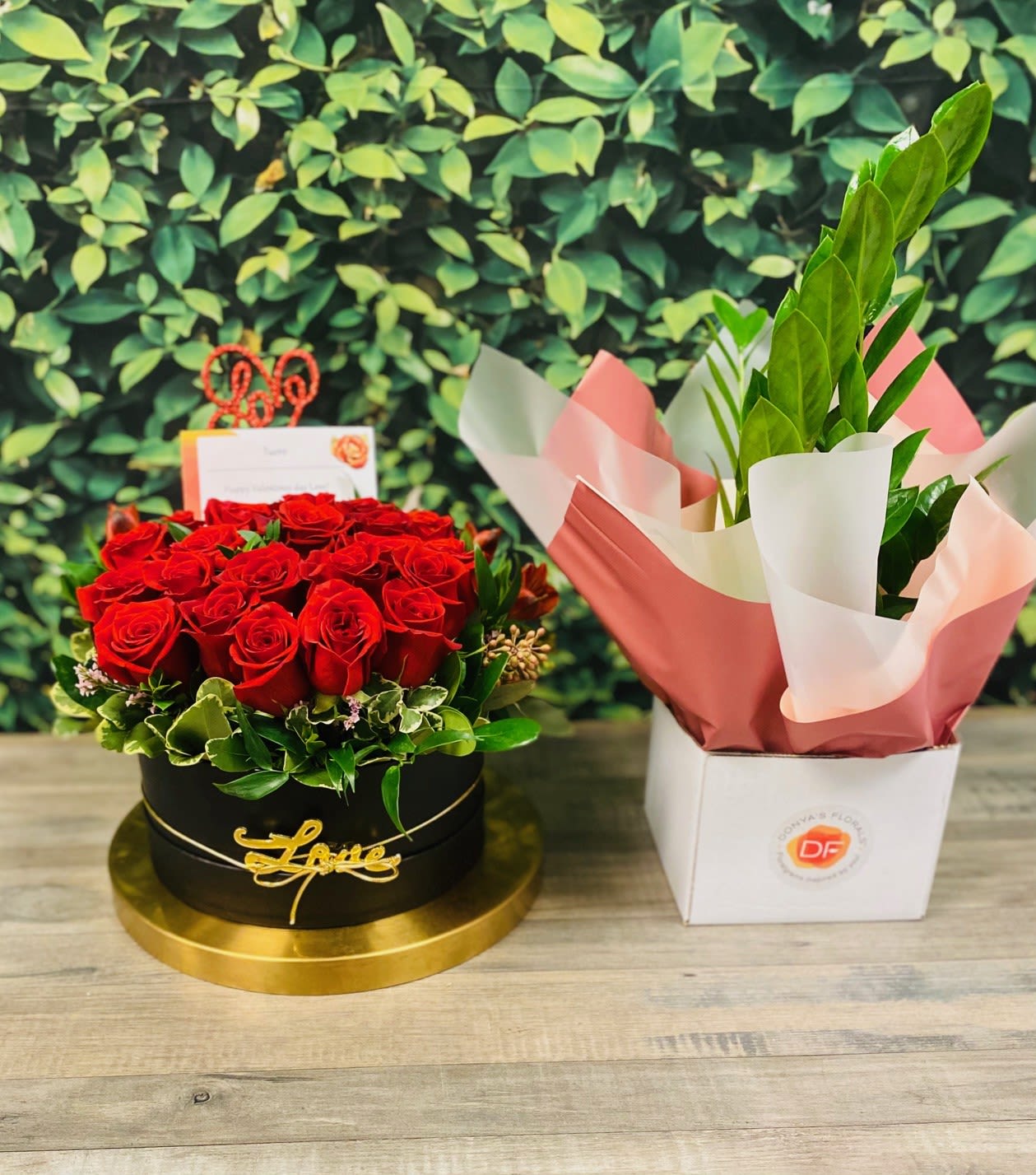 Bloomsical Box with Breathe Easy Plant and Personalized Card - Make a stunning statement with the Bloomisical Box—an artful arrangement of elegant roses and botanical fillers, curated for the special person who adores nature's gifts. Designed to delight the flower child and tree hugger, every detail is considered. All that's left is your personal touch with a gift card message.