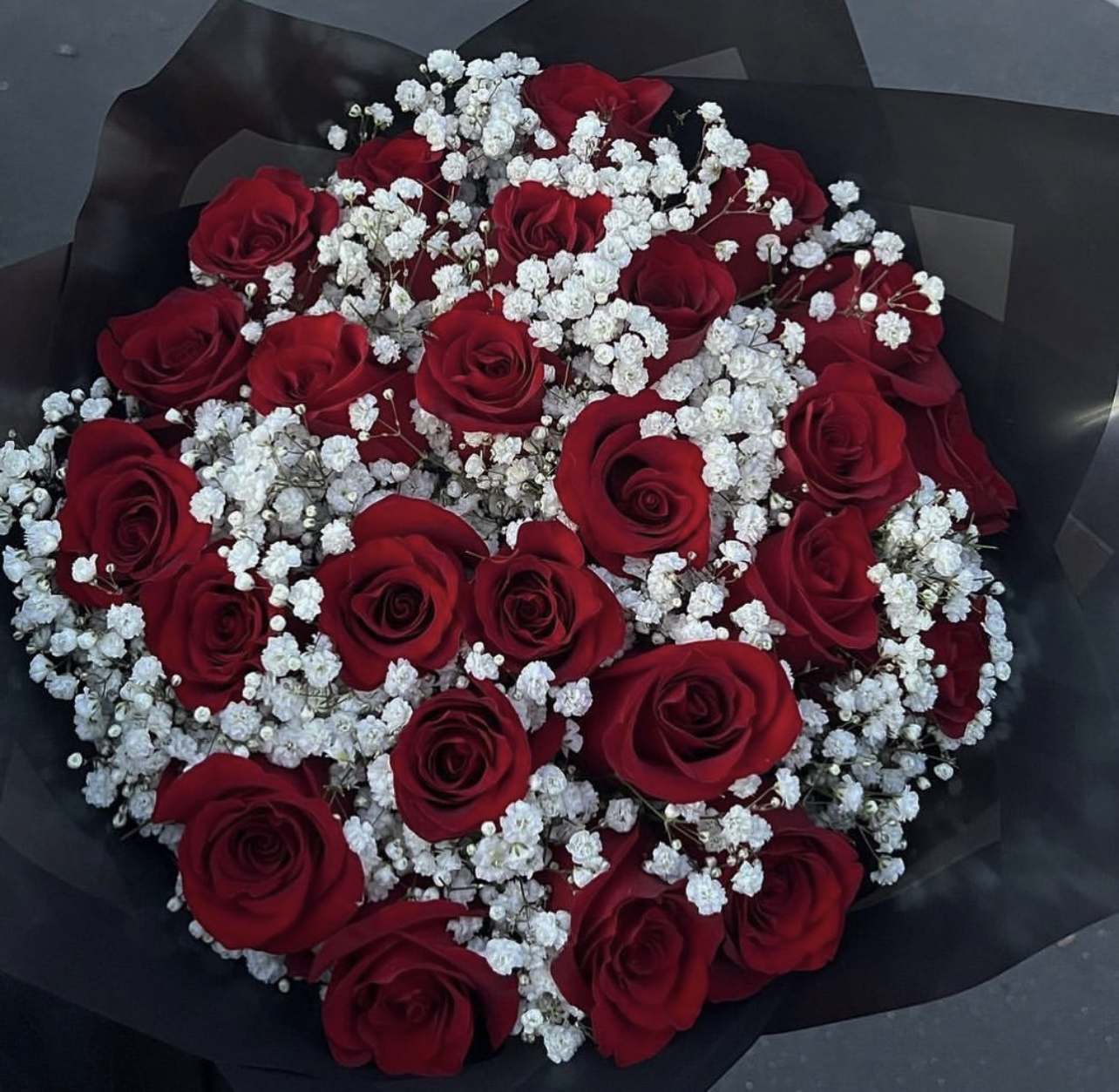 Paper Wrapped Opulent Roses  - 60 Long Stem Red Roses Five dozen of roses with baby breath, wrap white or black