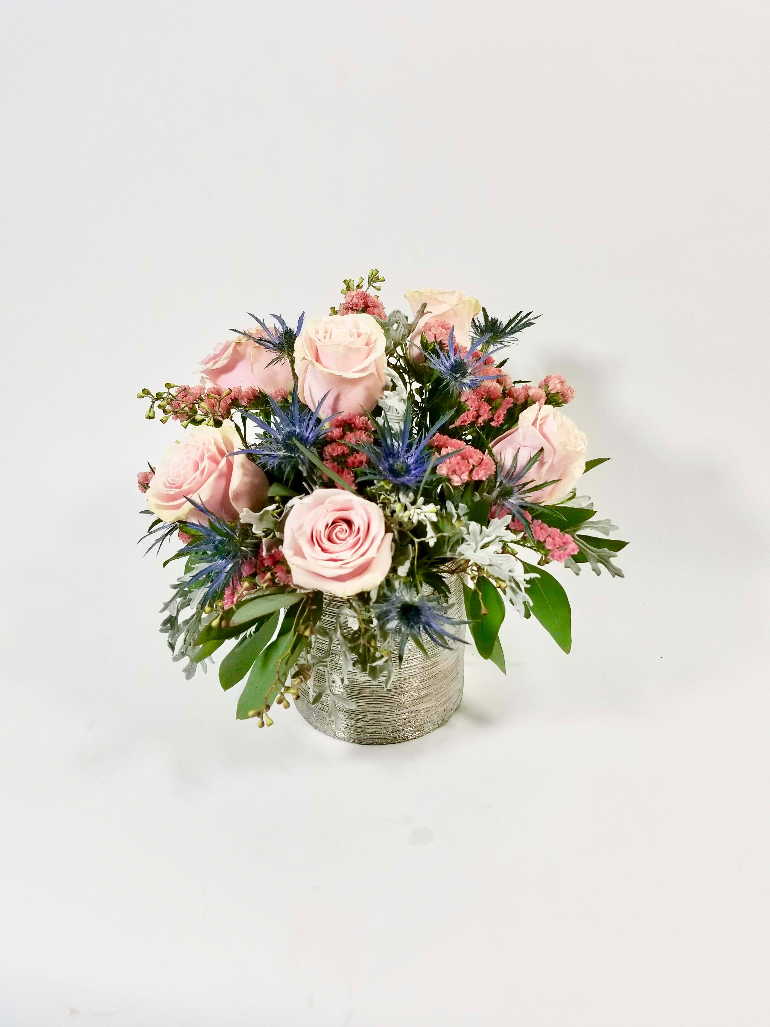 Vintage  - A beautiful Fresh Style bouquet in a silver vase with the best selection of premium pink roses and floral fillers to complement the design. 