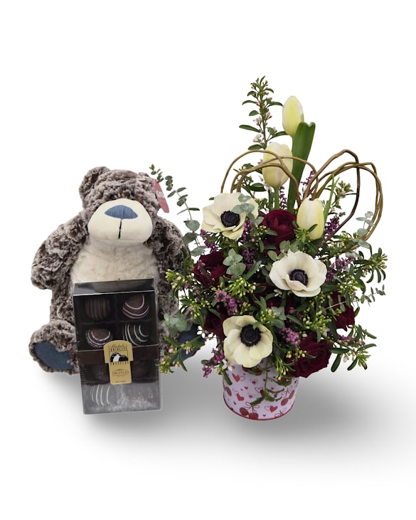 Cherry Bomb Bundle - Cherry Bomb Bundle pairs the bold Cherry Bomb arrangement with chocolates and a cuddly bear plush for a sweet and playful gift that combines flowers, treats, and a cozy keepsake.  Includes: -Cherry Bomb -Spokandy 8pc truffle -10" Bubba Bear