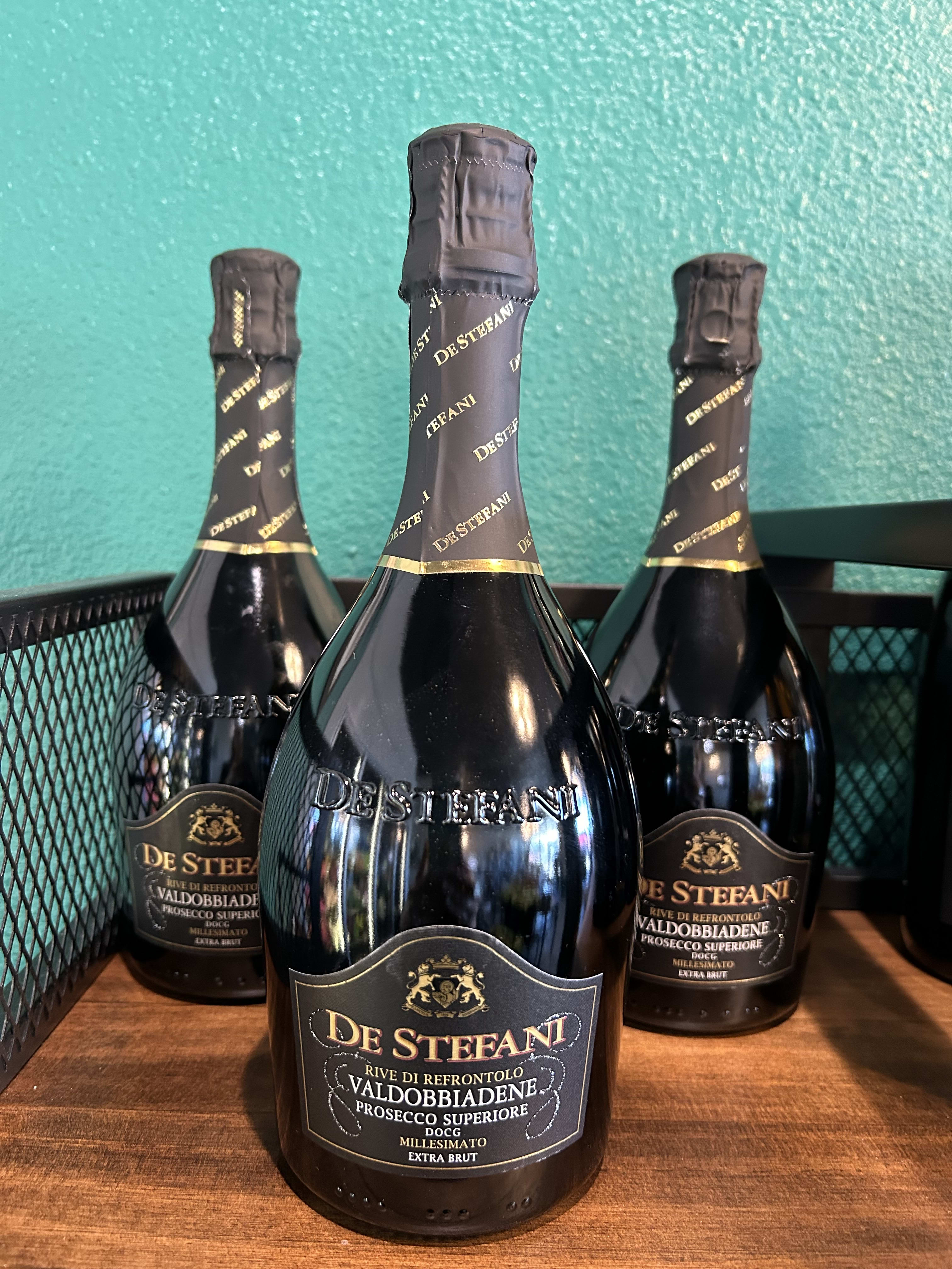 DE STEFANI PROSECCO DOCG - 93 Points-WINE ENTHUSIAST BEST PROSECCO IN THE WORLD  Fine and persistent perlage.  Full with bouquets, white flowers, green apple.  Dry and harmonious. To order wine from our catalog, both the customer and recipient must be at least 21 years old. Valid ID will be required upon delivery. By placing an order, you confirm that you and the recipient are of legal drinking age.