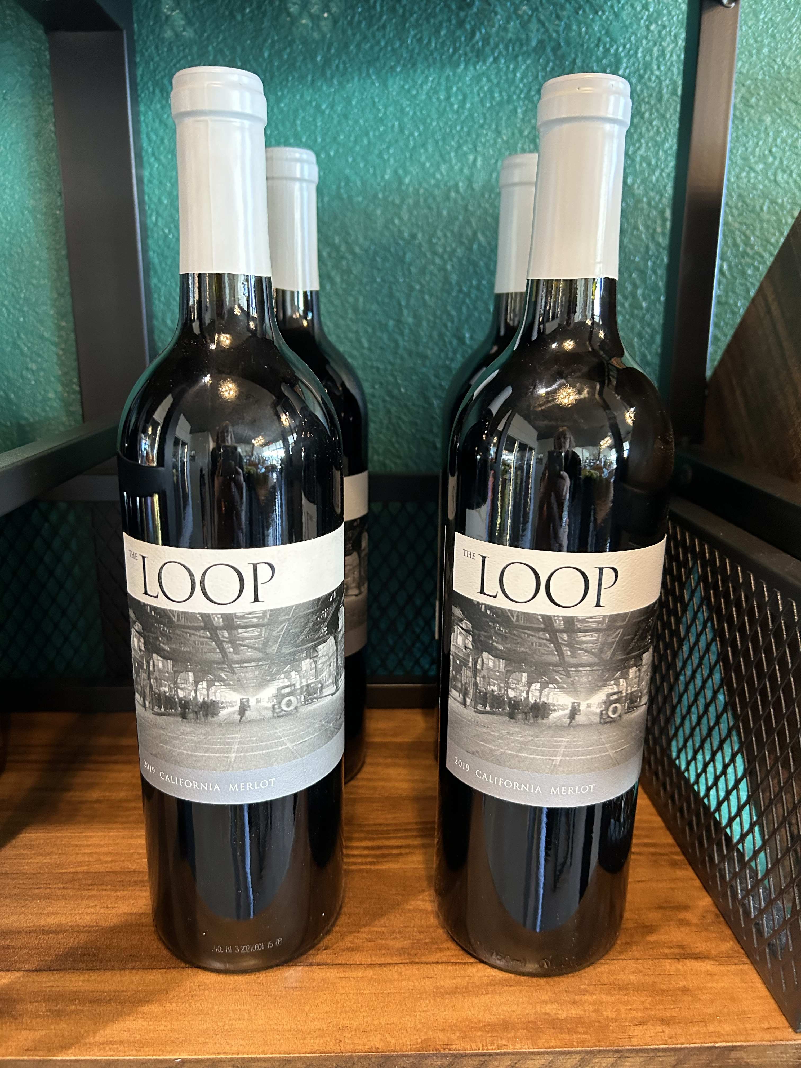 THE LOOP Merlot  - 100% Merlot  Terroir: California.  True California soil rich with nutrients.   Color: Ruby Red with purple hues. Nose: subtle notes of baking chocolate.  To order wine from our catalog, both the customer and recipient must be at least 21 years old. Valid ID will be required upon delivery. By placing an order, you confirm that you and the recipient are of legal drinking age.