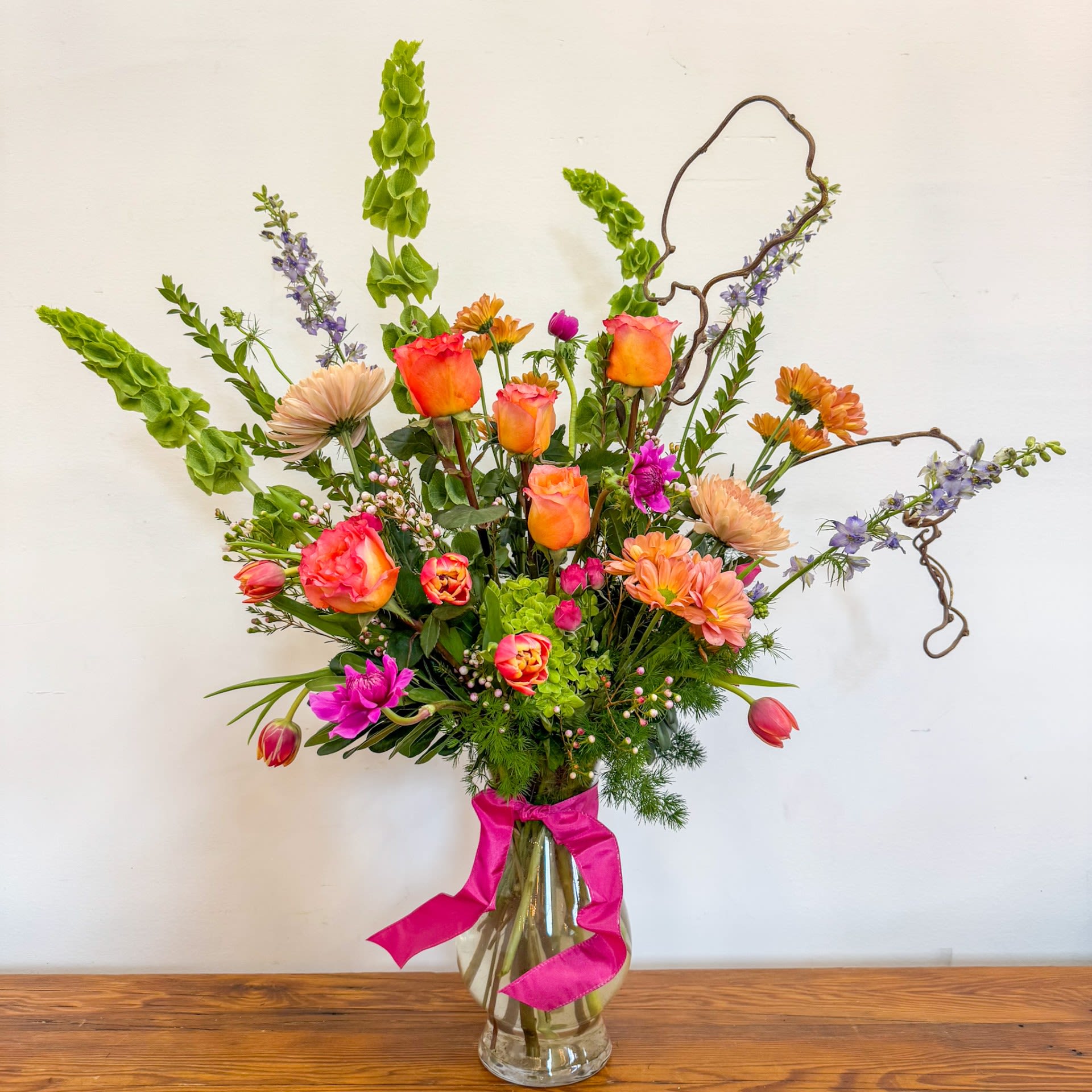 Designer's Choice: Garden Luxe - A bright palette of our freshest flowers in a large dramatic presentation. Sure to get a "wow."  Standard size measures approximately 19" x 32". 