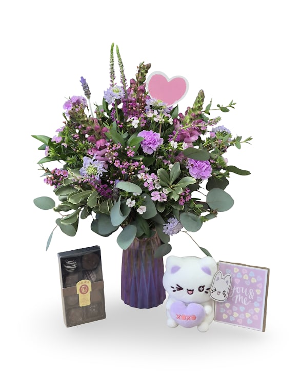Me and You Bundle - The Me and You Bundle includes our romantic Me and You arrangement paired with chocolates, a plush, and a card. To add a personal touch, we will hand write your message inside the card, making this bundle perfect for sharing love and thoughtful moments.  Includes: -Me and You Arrangement -8pc Premium Assortment -Candy Meowchi Plush -Me &amp; You Candy Greeting Card
