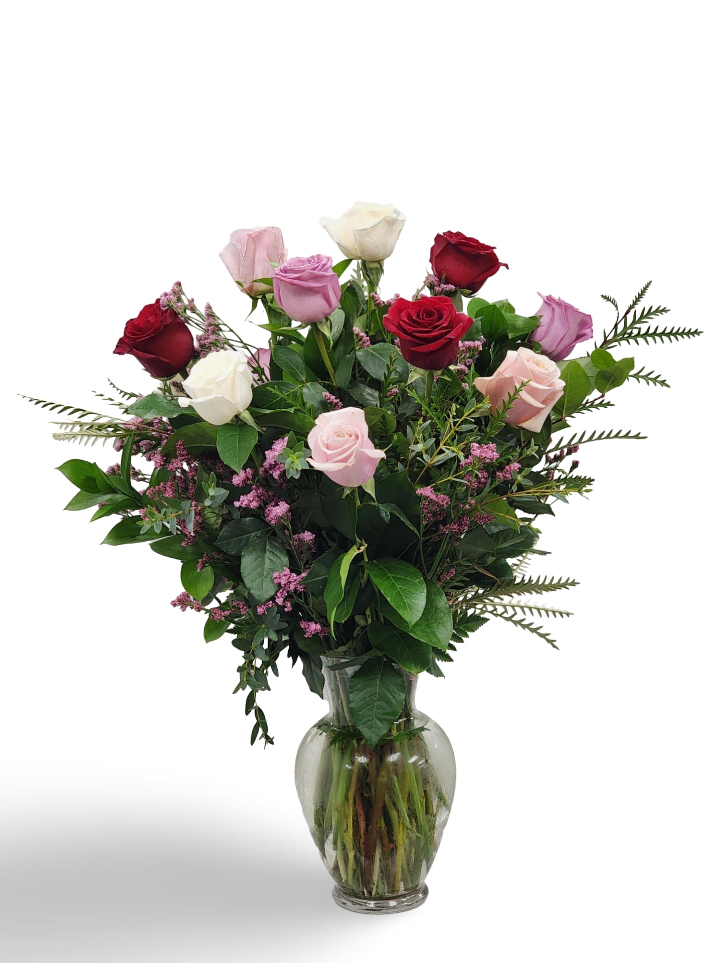 Long Stem Dozen Valentine Mix Roses - A vase full of a dozen roses in various shades of red, white, pink, and purples.