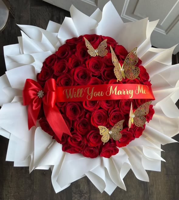 Romance love bouquet. - 100 red roses with marry me ribbon.