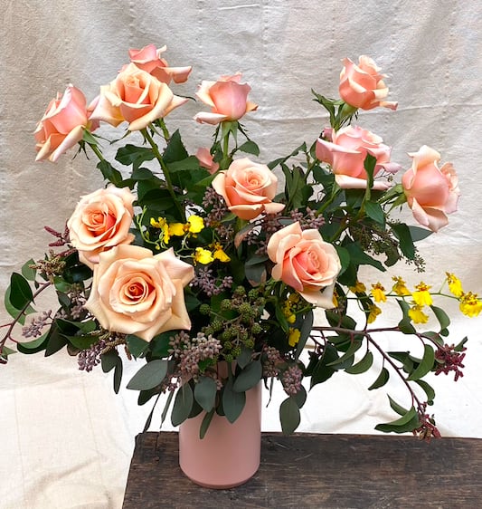 Antique Peach Dozen Roses - Warm and cheerful, this peach rose is one of our favorites. Designed with soft, whimsical and hardy botanical elements.  *Images are are representation of design style. All arrangements are made to order and selection varies based on availability that week.