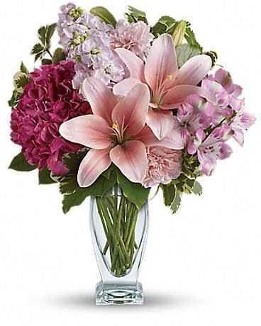 Blush Of Love Bouquet - Celebrate your love with this beautifully blushing bouquet! Luxurious lilies, delicate hydrangea and fragrant stock delight her senses, soothe her soul, and tickle her fancy. It's a loving gift she won't soon forget! Includes pink hydrangea, asiatic lilies, alstroemeria, carnations and stock, accented with fresh greens. Delivered in a Couture vase. 