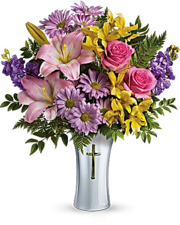 Bright Life Bouquet - Show them how much you care with this beautifully bright yet reverent arrangement of roses, lilies and alstroemeria. Gracefully presented in a shining, silver-finished ceramic vase with cross cut-out - a touching tribute to a bright life. This glorious arrangement includes hot pink roses, pink asiatic lilies, yellow alstroemeria, lavender stock, lavender daisy spray chrysanthemums, huckleberry and leatherleaf fern. Delivered in a Shining Cross vase. 