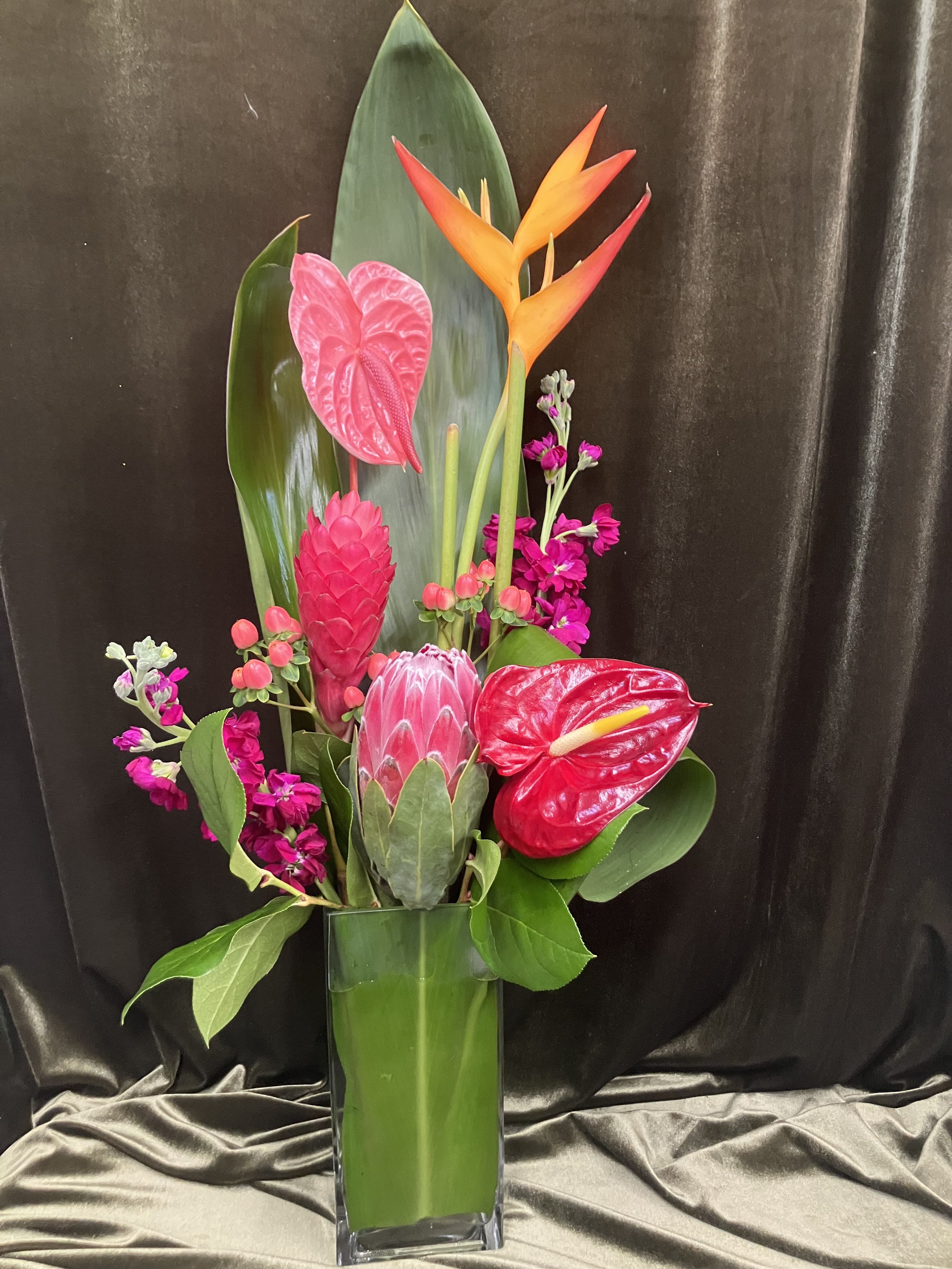 Tropical Flower Arrangement  - Bright, stunning flowers straight from Hawaii! Send a lovely assortment of tropical flowers!