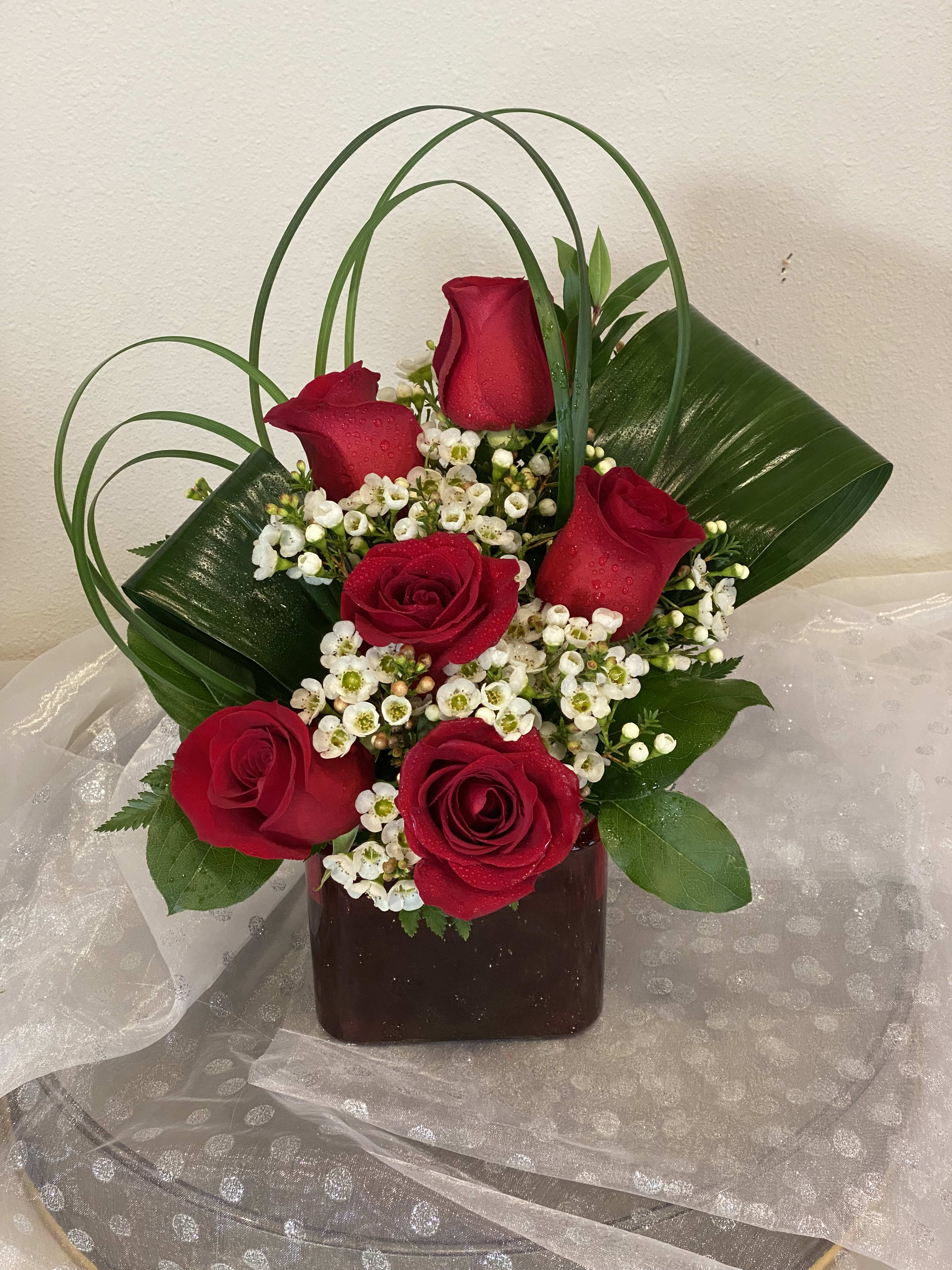 Endless Love - "Endless Love" says it all.....send these roses or upgrade with roses and lilies to the love of your life. Please keep in mind each arrangement designed might have some color changes based on current supply of flowers.