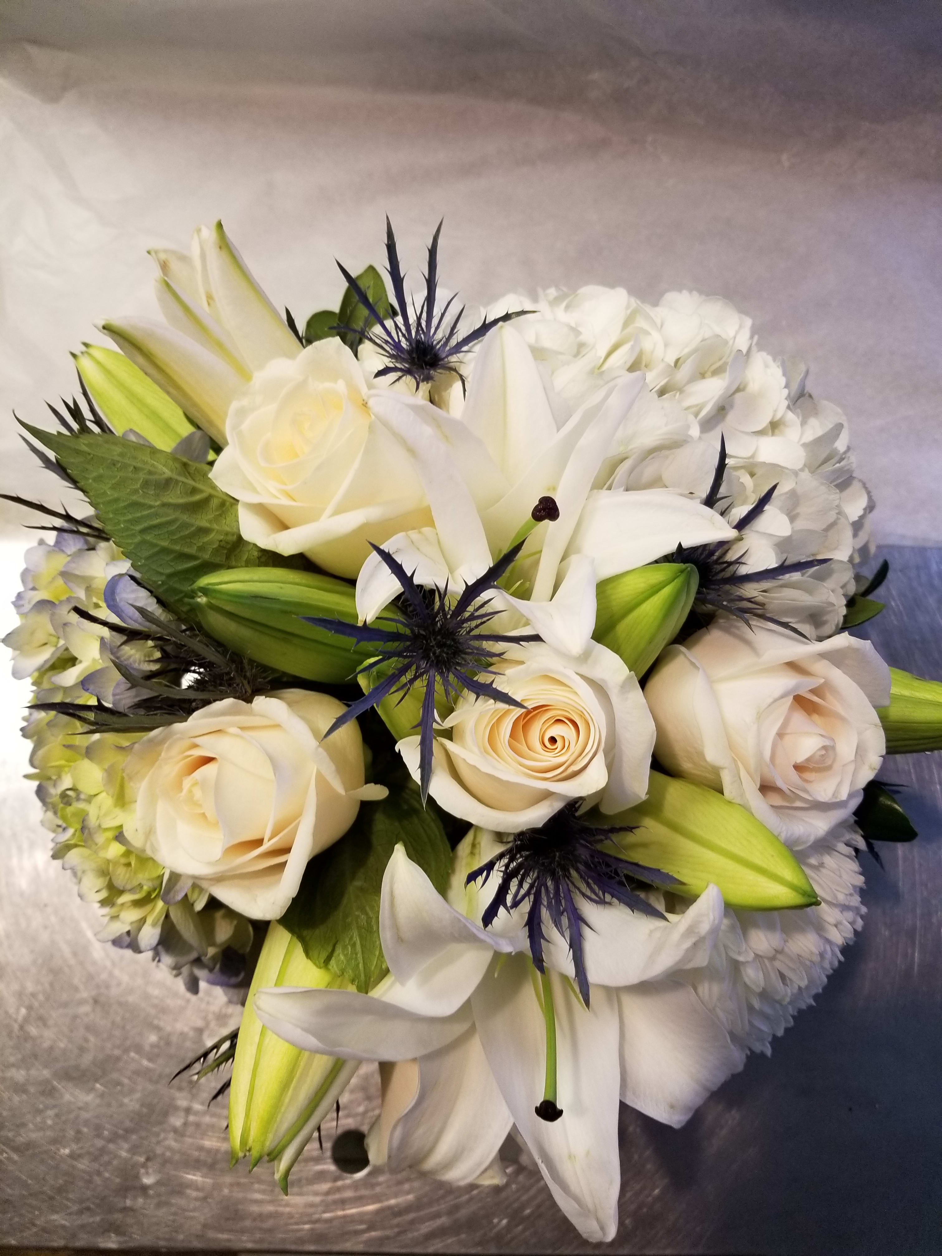  upper east  flower arrangements - mixed arrangement with roses and lilies  for everyday