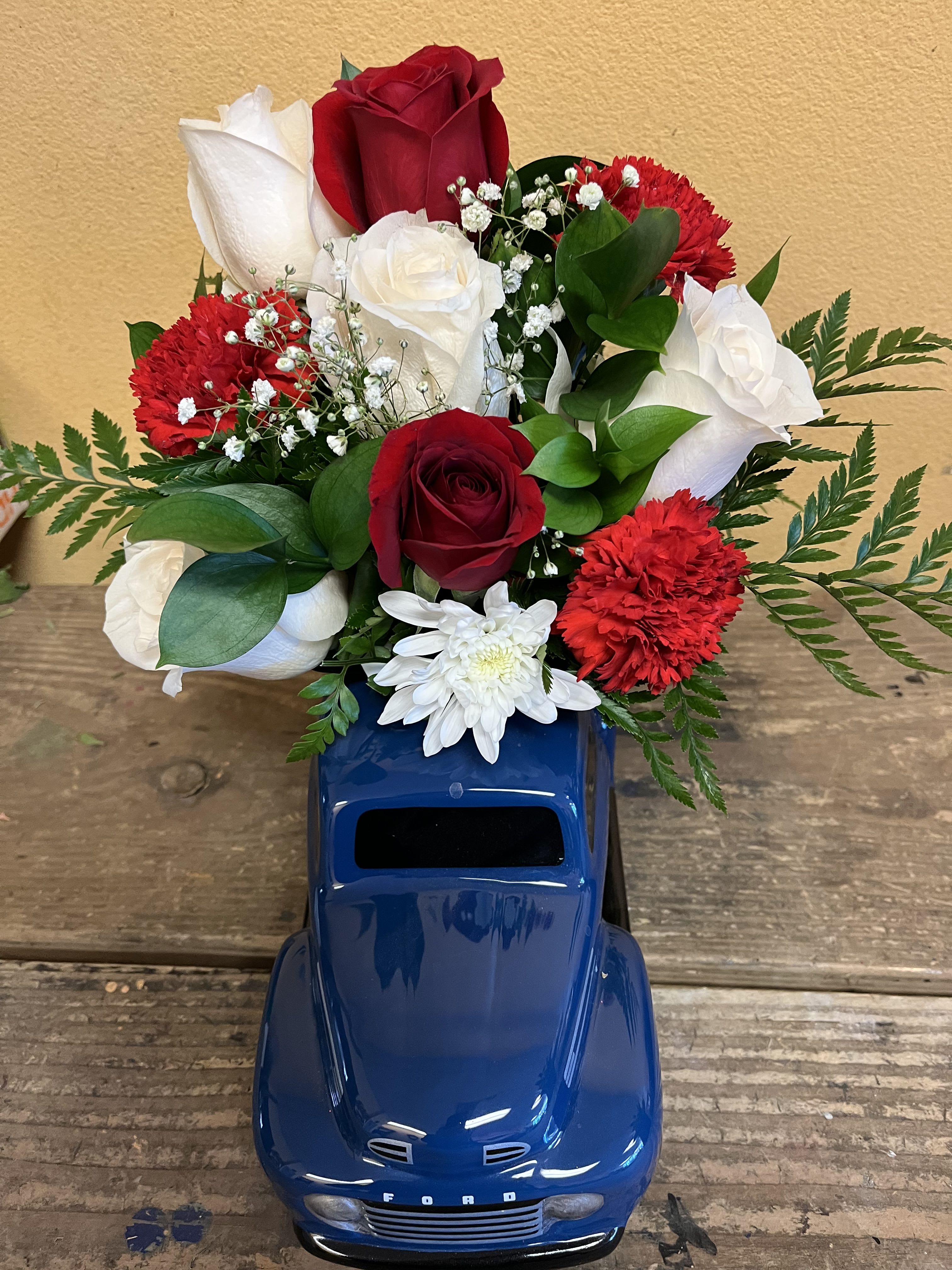 BE MY FORD VALENTINE - CERAMIC FORD TRUCK WITH FLOWERS TO INCLUDE ROSES, CARNATION, CUSHION AND BABY BREATH