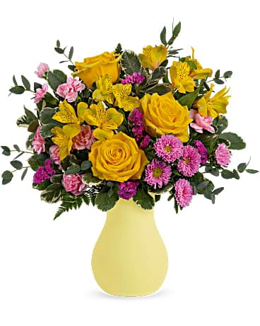 Happy As Can Be Bouquet - Pure happy! Brighten any day with this joyful bouquet of yellow roses and pink blooms, arranged in a fabulous frosted glass vase. Yellow roses, yellow alstroemeria, miniature pink carnations, pink matsumoto asters and raspberry sinuata statice are arranged with variegated pittosporum, leatherleaf fern and parvifolia eucalyptus. Delivered in Teleflora's Serendipity Glass Vase. 