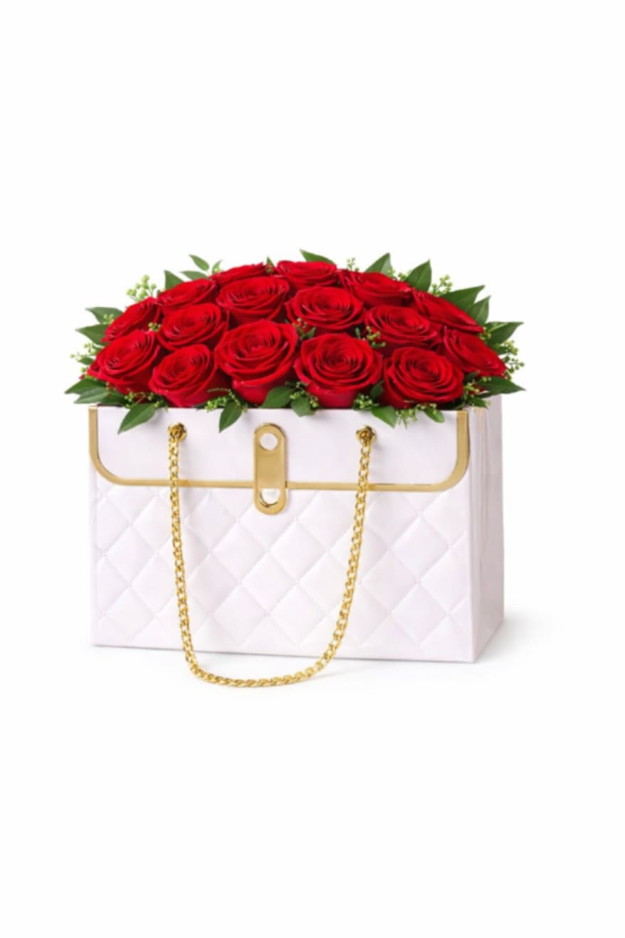 Classic Red Purse Rose Box - A timeless dome of rich red roses designed in our signature white purse box with gold accents. Clean, modern, and made to wow—perfect for sending a bold “I love you” in the most elegant way. Best for: Romance, anniversary, Valentine’s Day, birthday, “thinking of you,” congratulations.