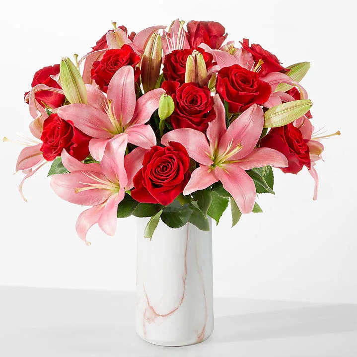 Roses and Lilies - Classic beauty. Pink or white lilies may be used. 