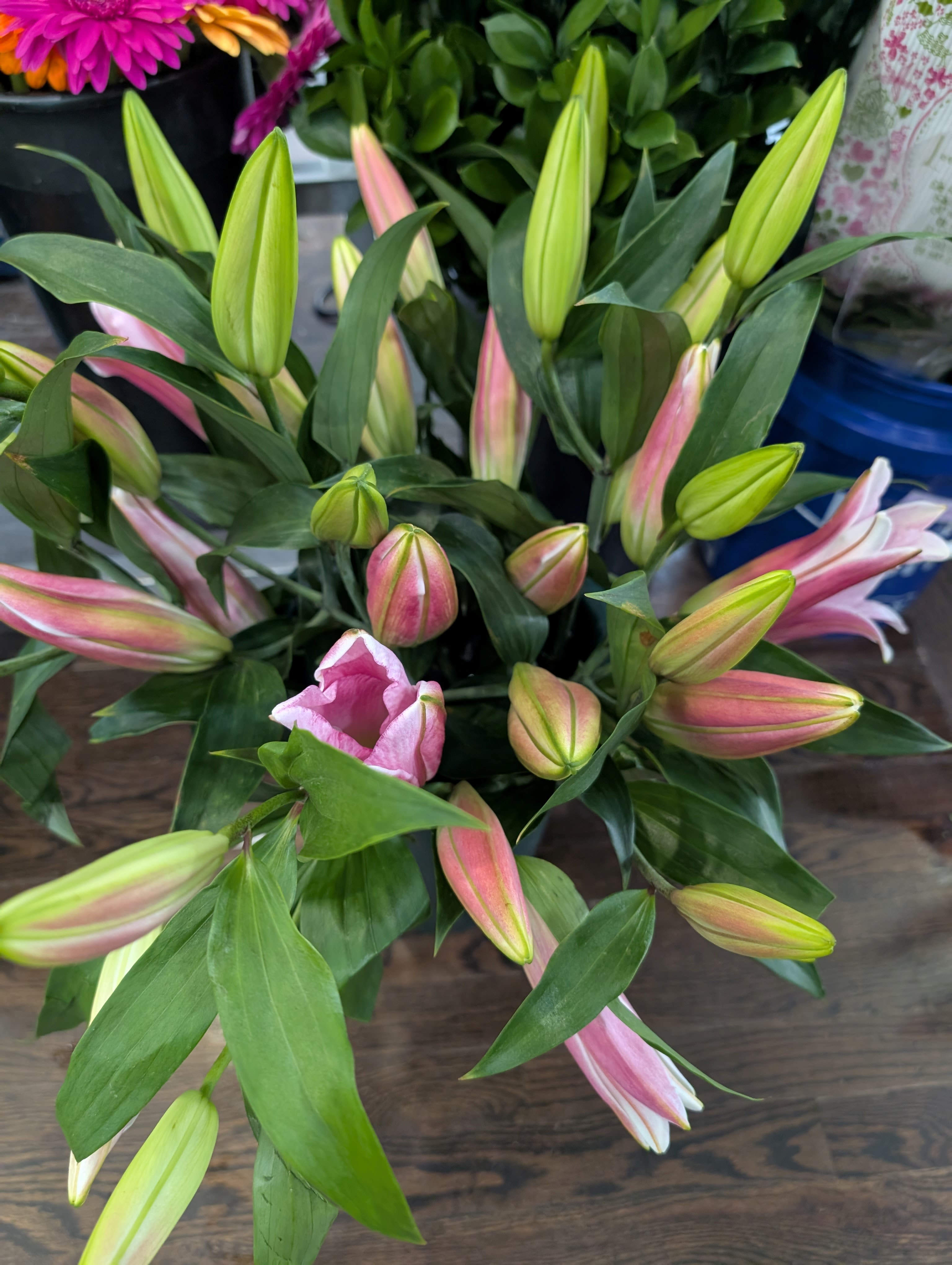 Lily Hand Bouquet - An assortment of 3 lilies and other fillers
