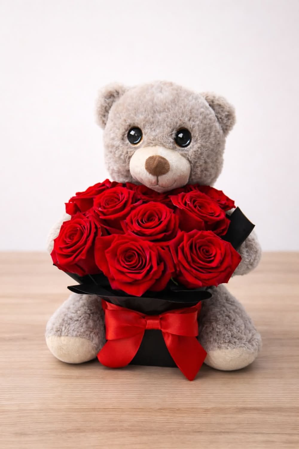 Love You Beary Much - Love you beary much ️ This adorable teddy bear arrangement is holding a bouquet of fresh, vibrant red roses—designed to say I love you without saying a word. The perfect Valentine’s Day gift for someone special, combining cuddles and classic romance in one unforgettable surprise.