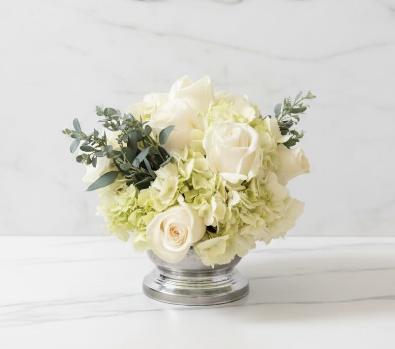 Simplicity by BloomNation™ - Simplicity is the perfect gift to wish a happy birthday, show gratitude, or wish a speedy recovery.   Arrangement Details: Includes blush pink roses, white roses, white hydrangea. APPROXIMATE DIMENSIONS: 10" H X 11" W X 11"L