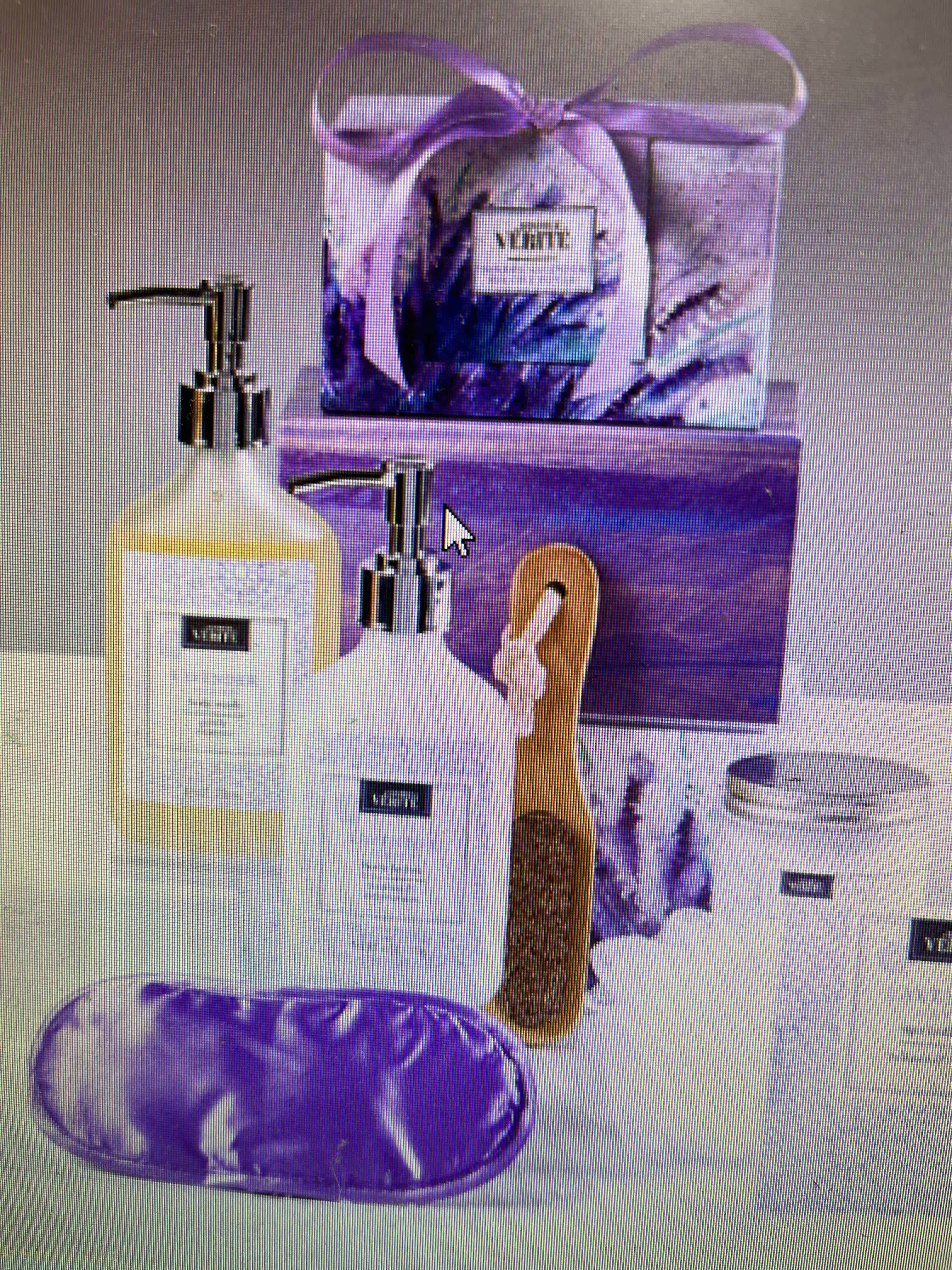 Denaril Lavender Spa Basket - Natural Woven Rope Basket, White  Source Vérité Denarii Lavender body lotion, shampoo, shower gel, essential oil, and body scrub  Includes a natural ramie spa mitt, exfoliating spa towel, wood handled pumice stone, and mesh bath sponge  Denarii Lavender lotions and gels are made exclusively in the U.S.A.