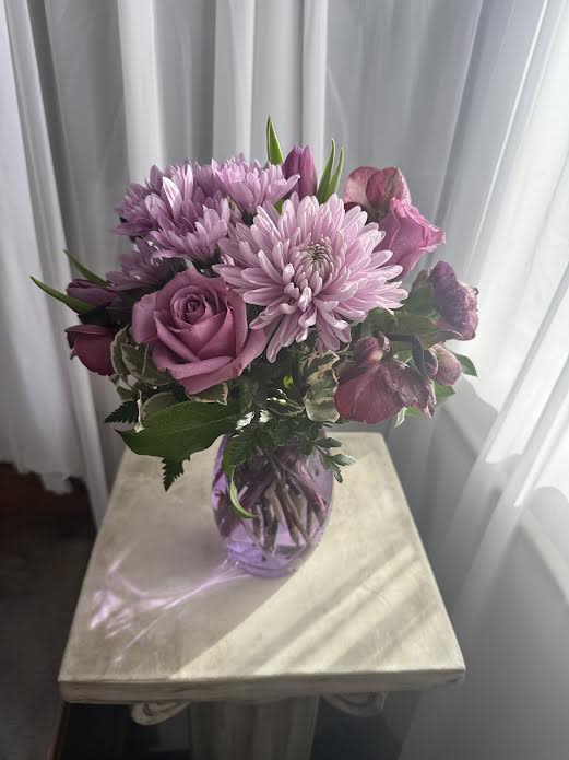 Lovely Lavender - Shades of purple and lavender are gathered in a lovely keepsake vase.  Call shop to ensure we have this vase and these flowers because our inventory constantly changes.