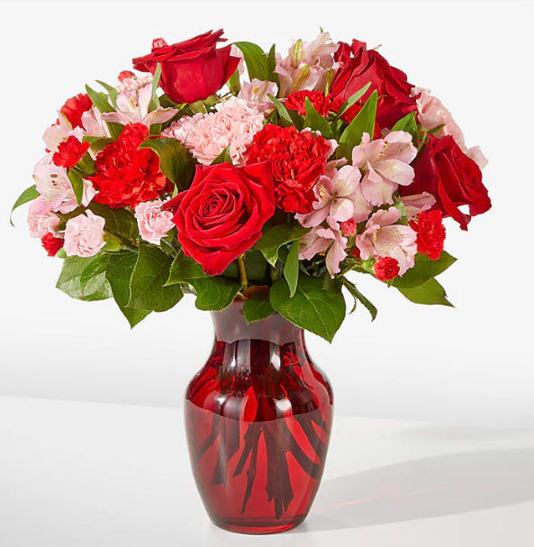Candy Kisses Bouquet - As sweet as candy, this pink and red arrangement is sure to add a sugary rush to their Valentine's Day.