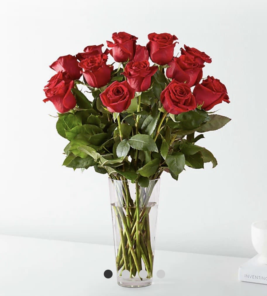 Red Red Red Roses for Her - LONG STEM RED ROSE BOUQUET  You can never go wrong with a bouquet of hand delivered long stem red roses from a local florist. Let our network of expert florists design this timeless red bouquet to make a statement for your special someone. Red flowers are an elegant, iconic and romantic gift for anyone close to your heart. Each rose is handcrafted and hand delivered to say "I love you" directly from a local florist to their home or office. (1Doz, shown)