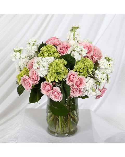 Smile in Flowers - Spray roses (we choose the color), hydrangea, and stock. Classic and elegant. 