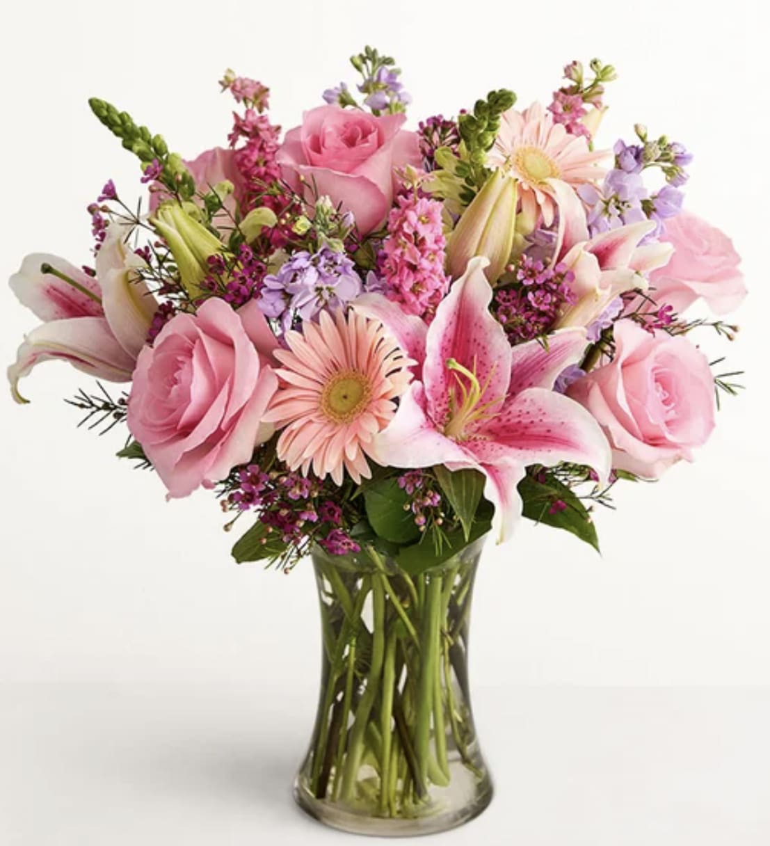 Always On My Mind - When it comes to letting someone know they’re always on your mind, think pink and lavender. We’ve hand-gathered a romantic mix of pink and purple blooms to create a gorgeous, garden-inspired bouquet