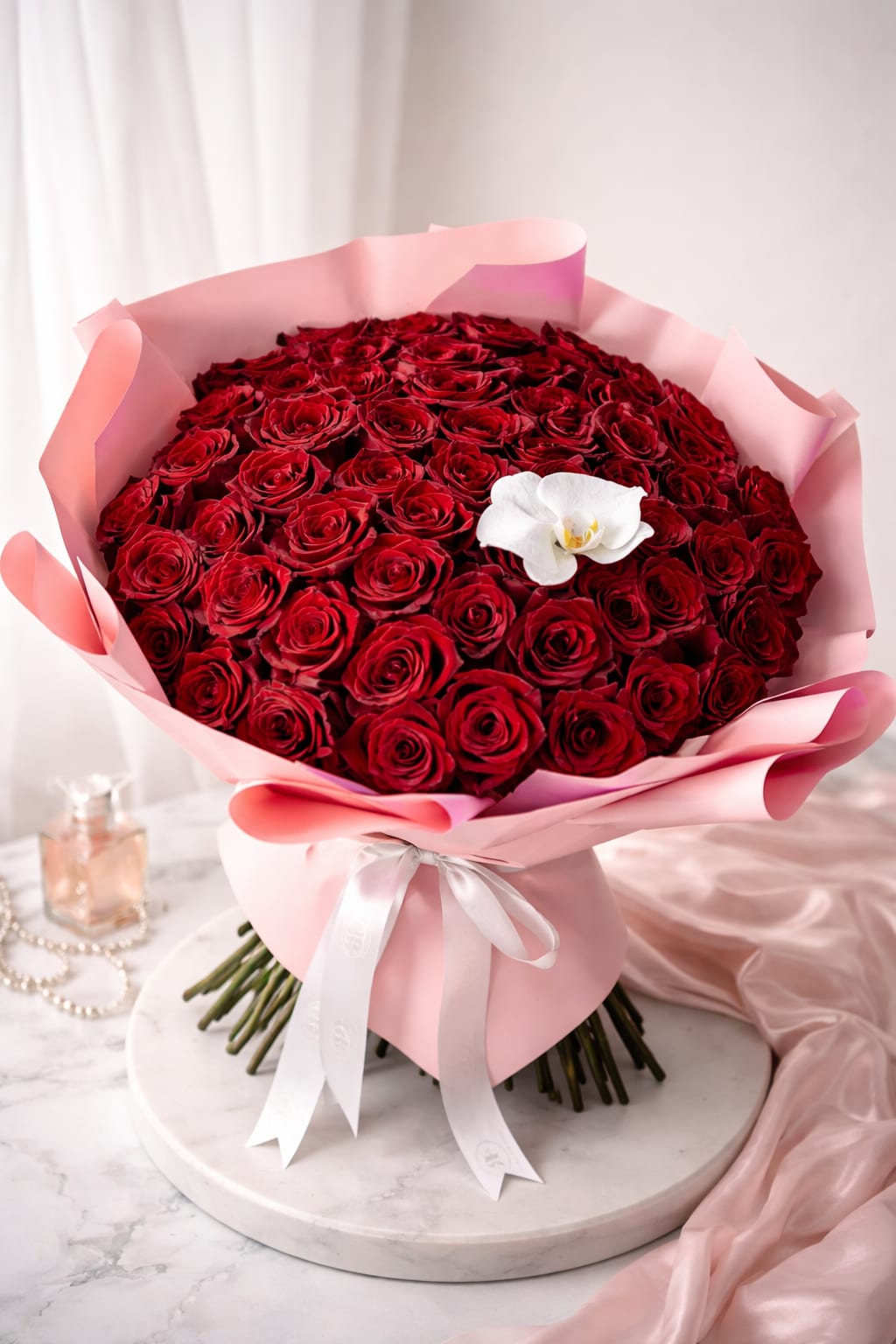 Orchid Kiss Bouquet (40/50/60 roses) - Orchid Kiss (40/50/60 roses) bouquet is perfect for a romantic evening, a special anniversary, a birthday surprise, or simply a day when words are not enough.   50 roses - DELUXE size is SHOWN in the main picture. The arrangement will be created approximately as shown. 