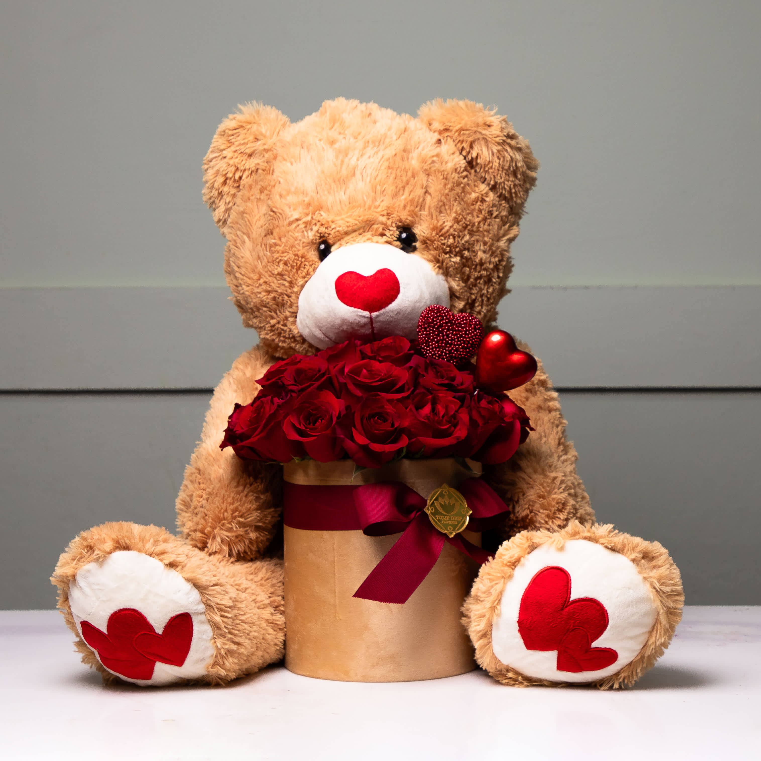 Teddy Bear #1  - Surprise your special someone with the perfect Valentine’s Day gift – a big, cuddly teddy bear paired with a stunning arrangement of fresh red roses. This heartwarming combination is the ultimate way to express love, affection, and romance. 	•	Premium Fresh Roses: Handpicked for their beauty and quality. 	•	Adorable Teddy Bear: A keepsake to cherish long after Valentine’s Day.
