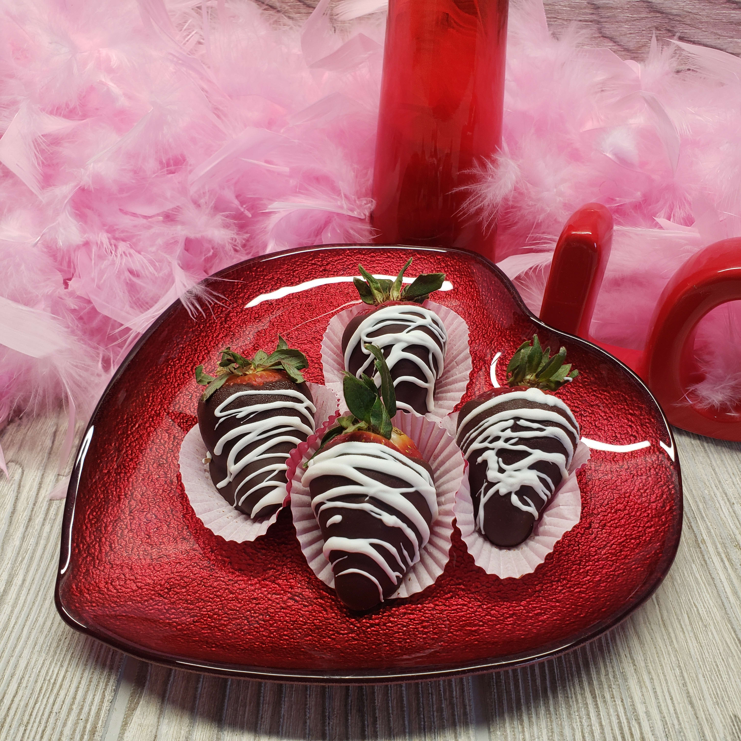 Chocolate Covered Strawberries 4Pk - Treat that special person in your life! 4 hand dipped chocolate covered strawberries made from a local artisan.  