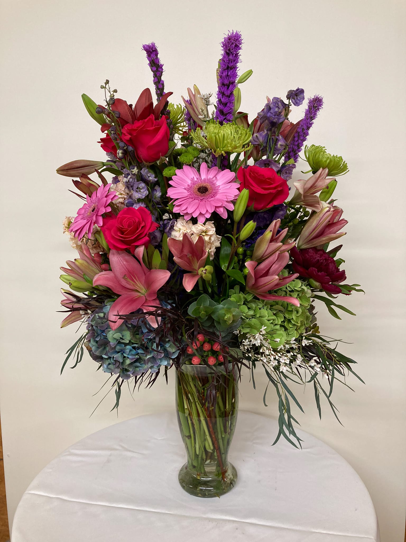 Fantasia - A myriad of colors, a myriad of flowers, spin a fantastic bouquet in a tall vase.