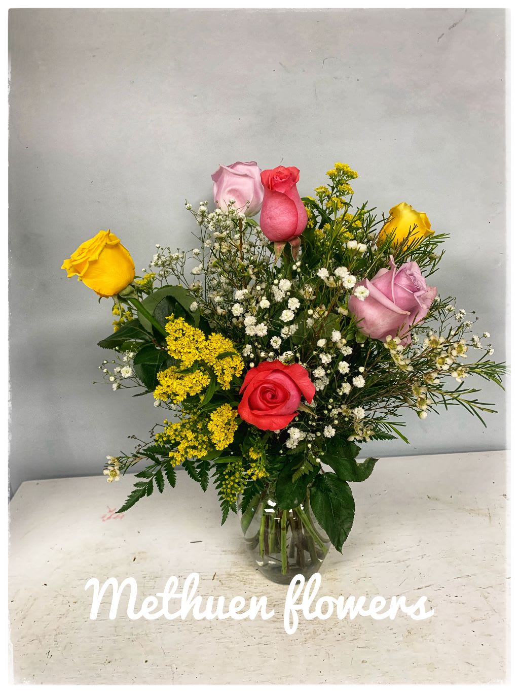 Six Lovely assorted Roses - Six assorted roses with fillers and greens