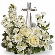 DIVINE PEACE - TRADITIONAL WHITE FLOWERS ARRANGED AROUND A BEAUTIFUL SOLIDE CRYSTAL CROSS