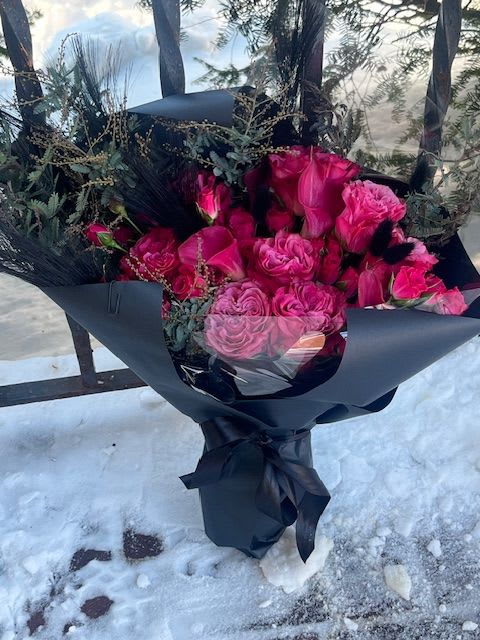 In the Mood - This moody, luxe, winter bouquet is romantic, vibrant, unapologetic and perfect for Valentine's Day!  A bright monochromatic mix of pink roses, callas and the best what the pinks have to offer.